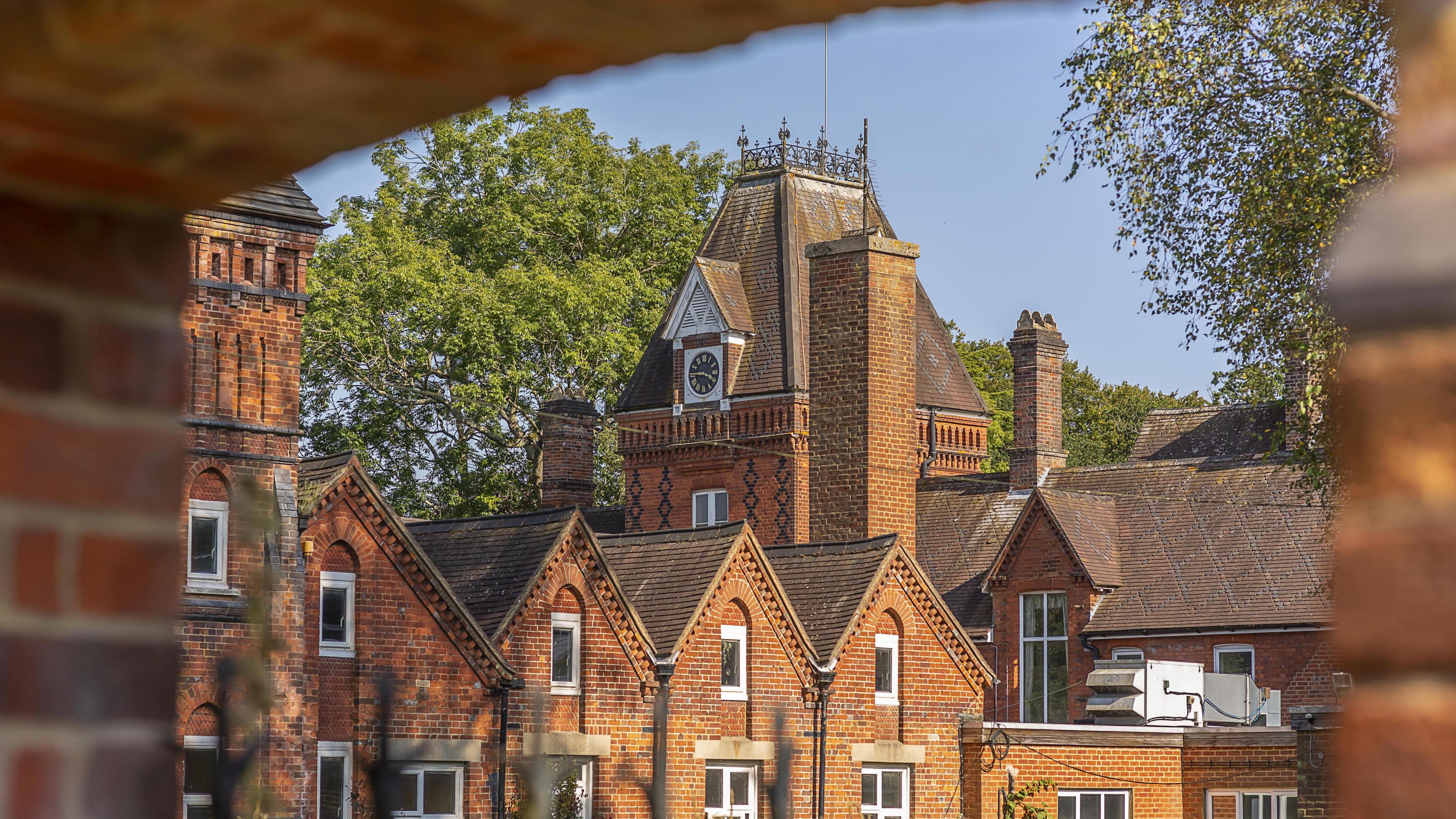 A shot of the orange brick Victorian buildings at Rayners Penn