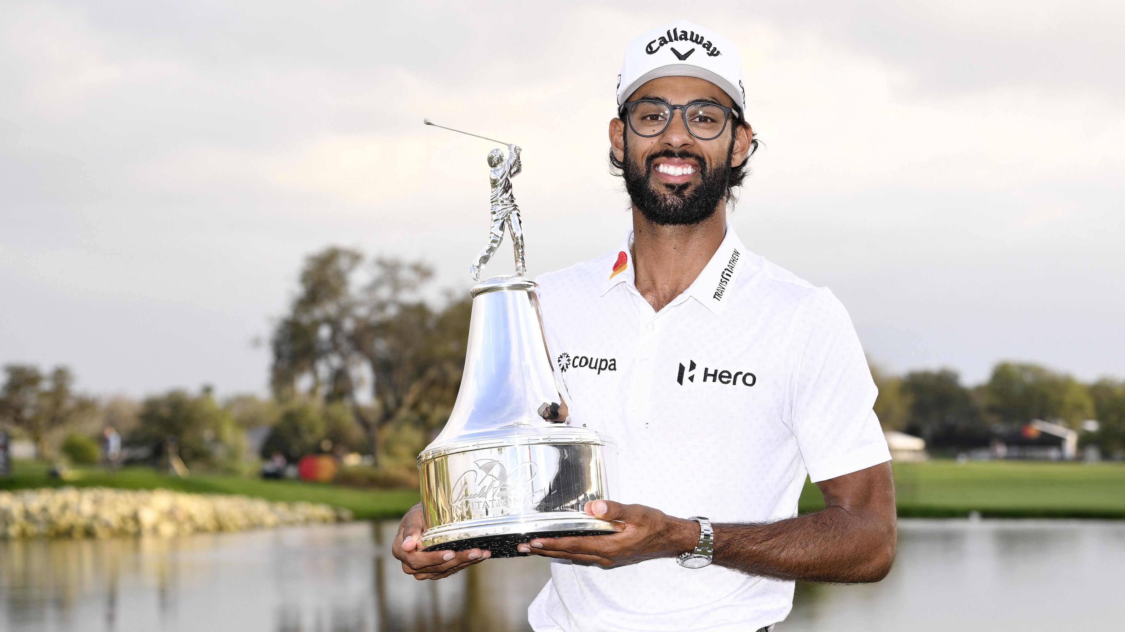Akshay Bhatia poses with a trophy