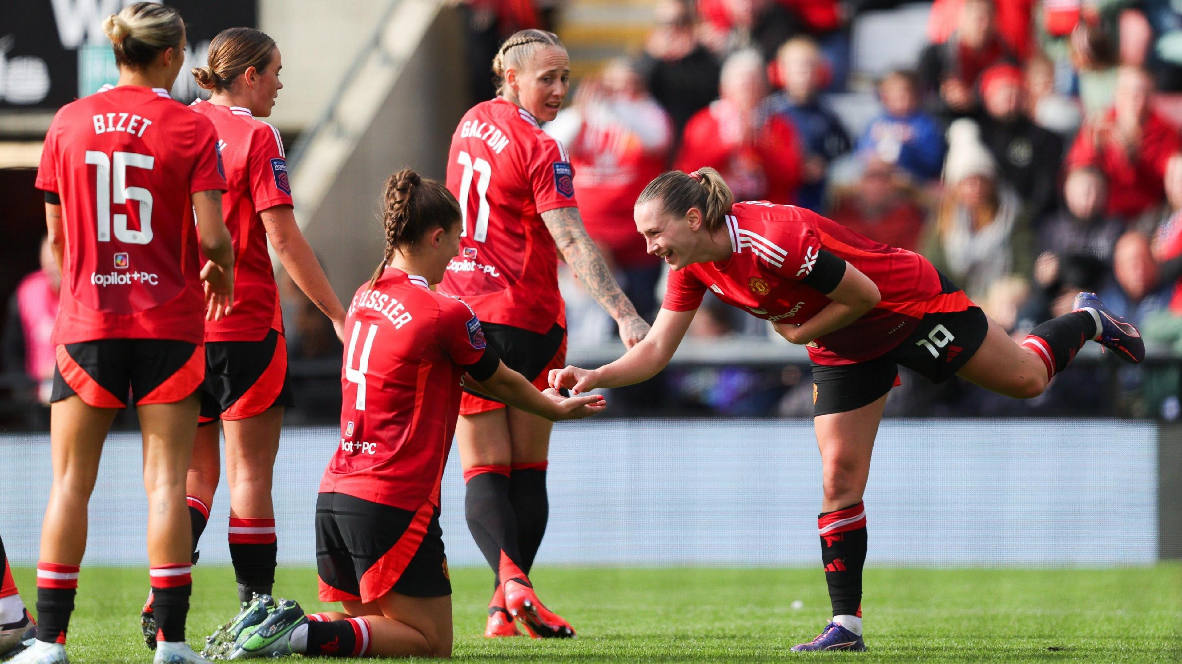 Elisabeth Terland of Manchester United celebrates after scoring a goal. 