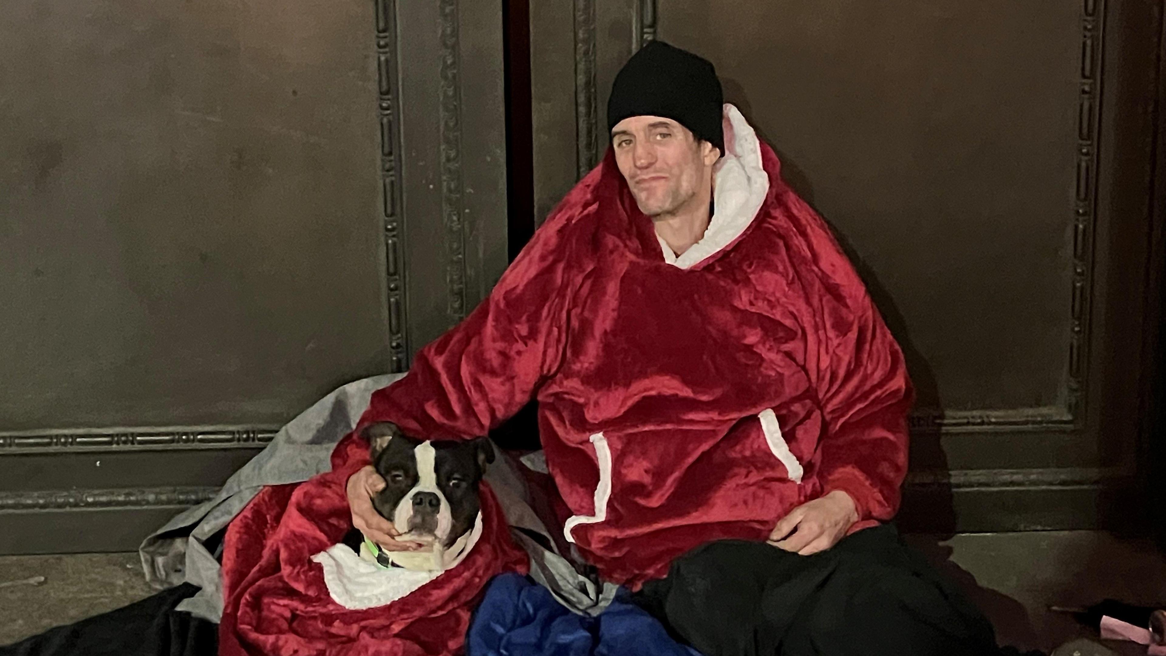 Photograph of Paul McDonagh from Galway in Ireland. He is pictured in St Peter's Square with his pet dog.