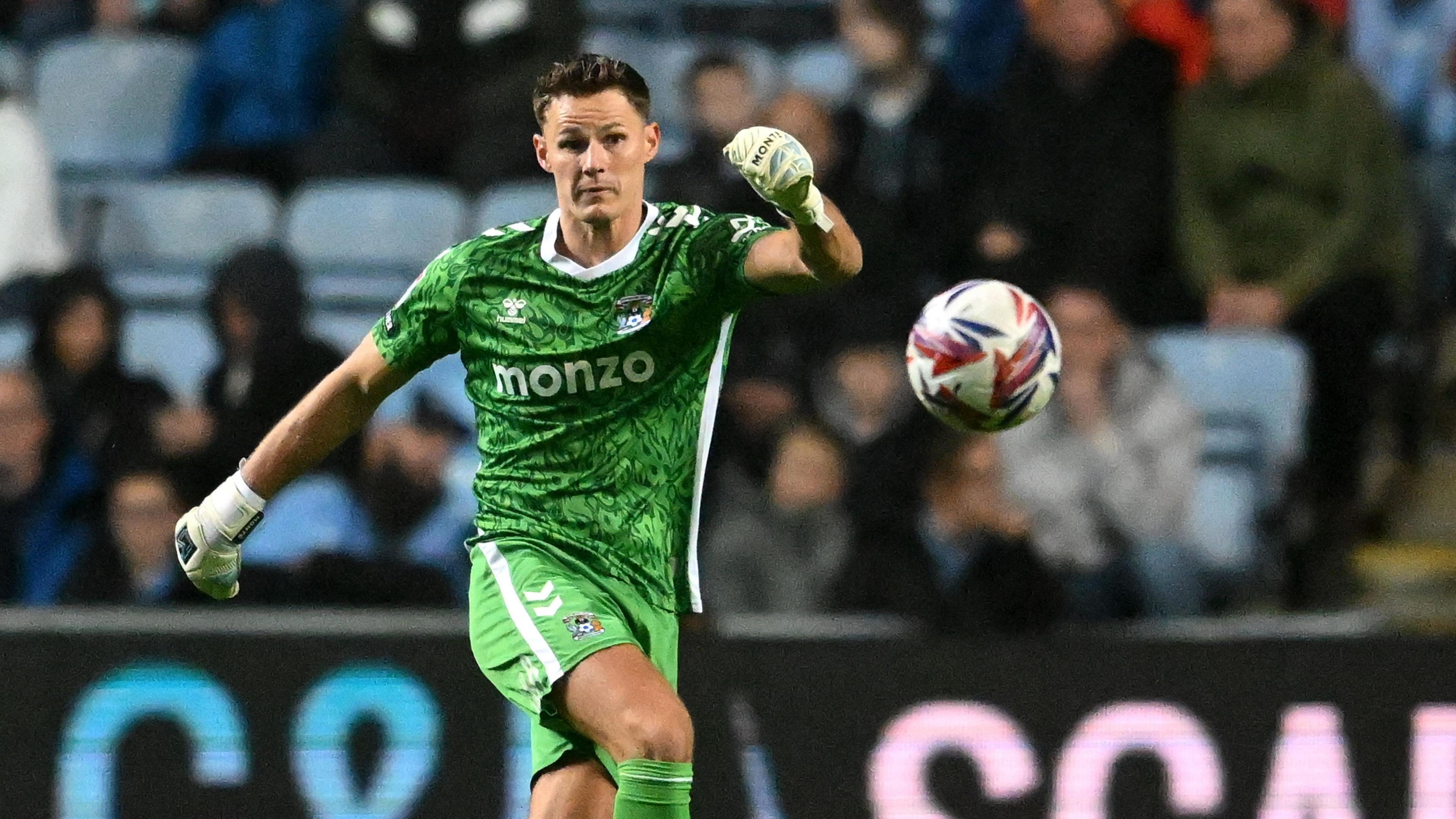 Ben Wilson clears the ball for Coventry City