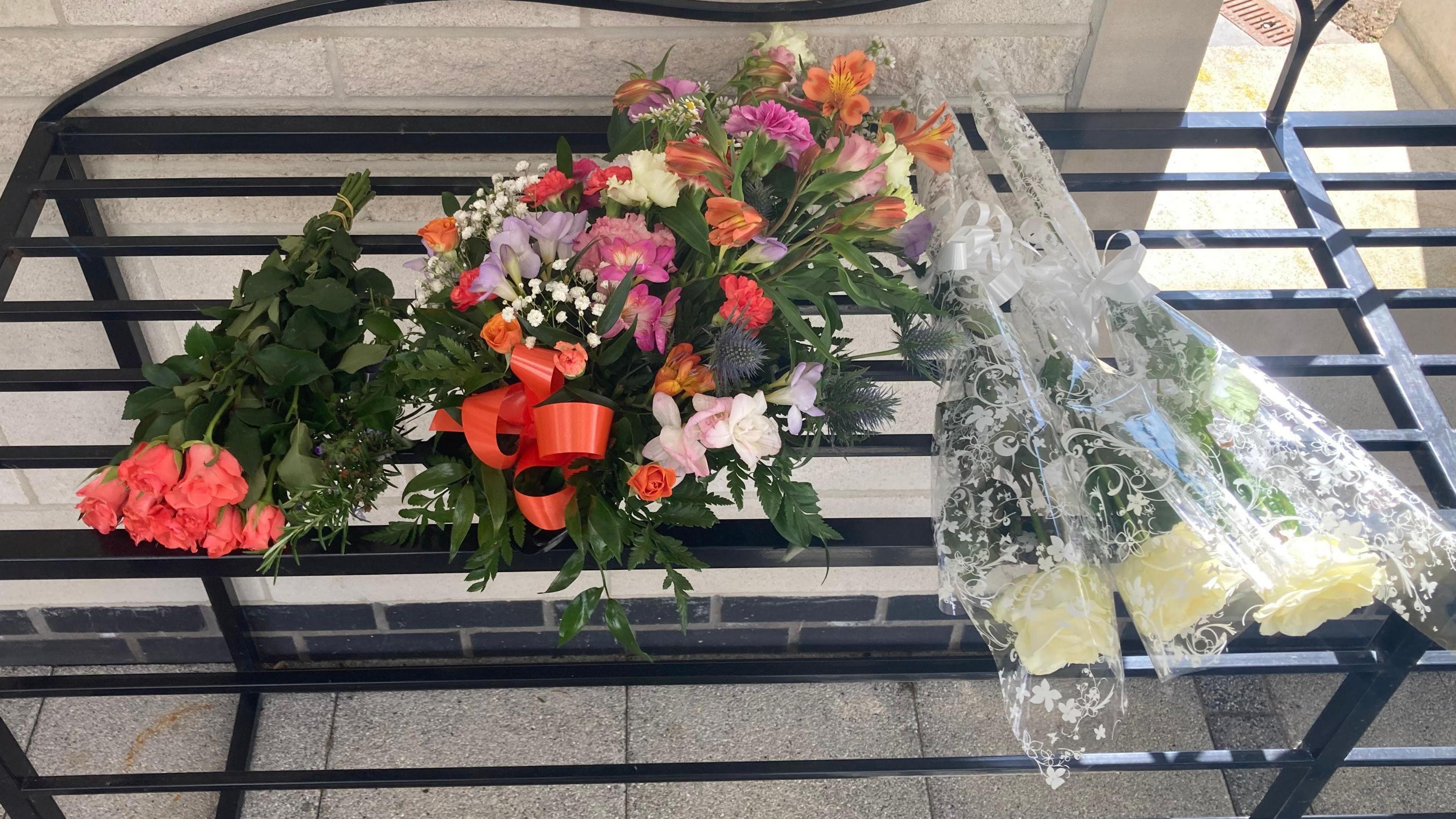 Flowers for Charles outside the crematorium