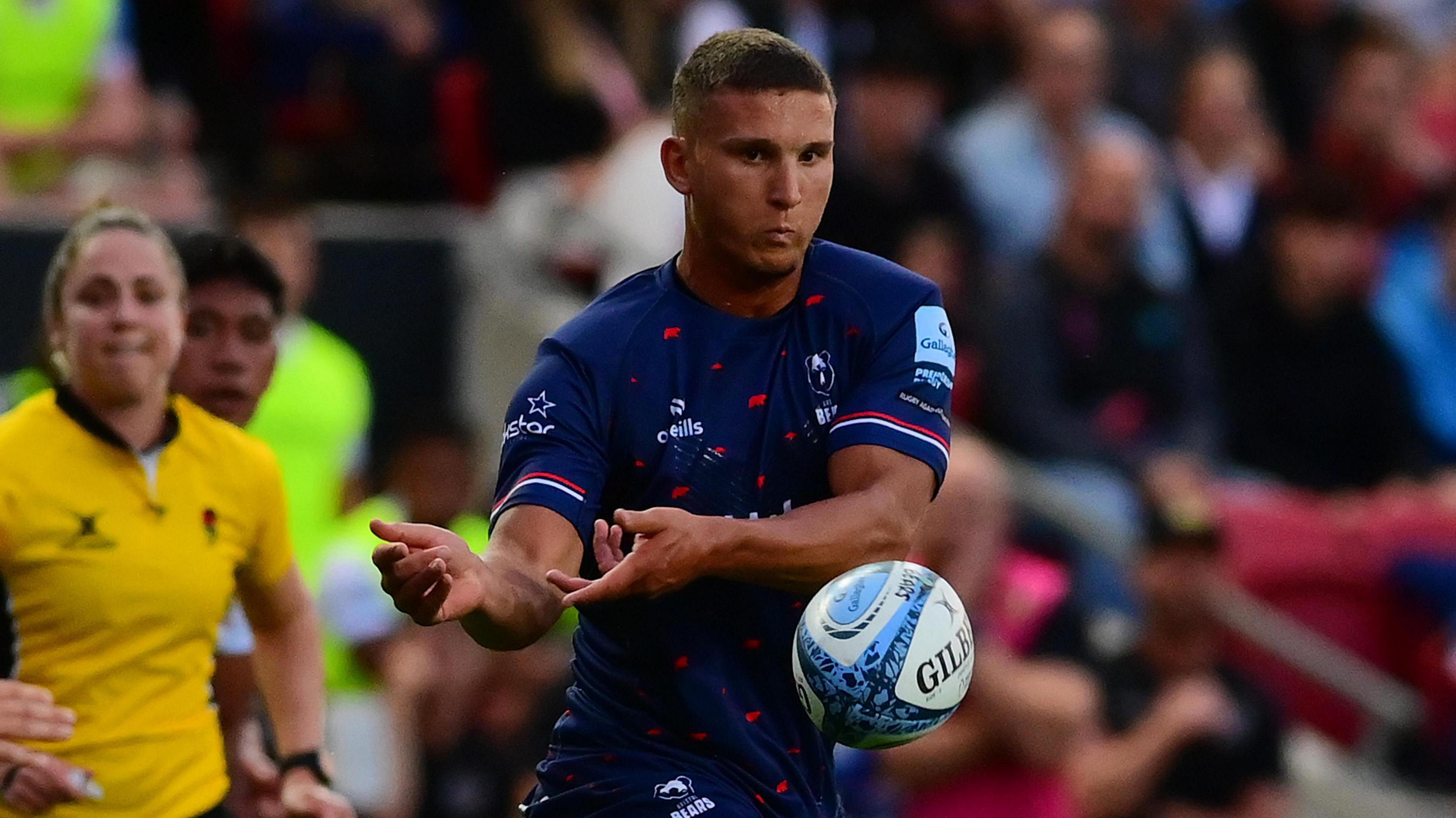 Harry Ascherl throws the ball during a match for Bristol