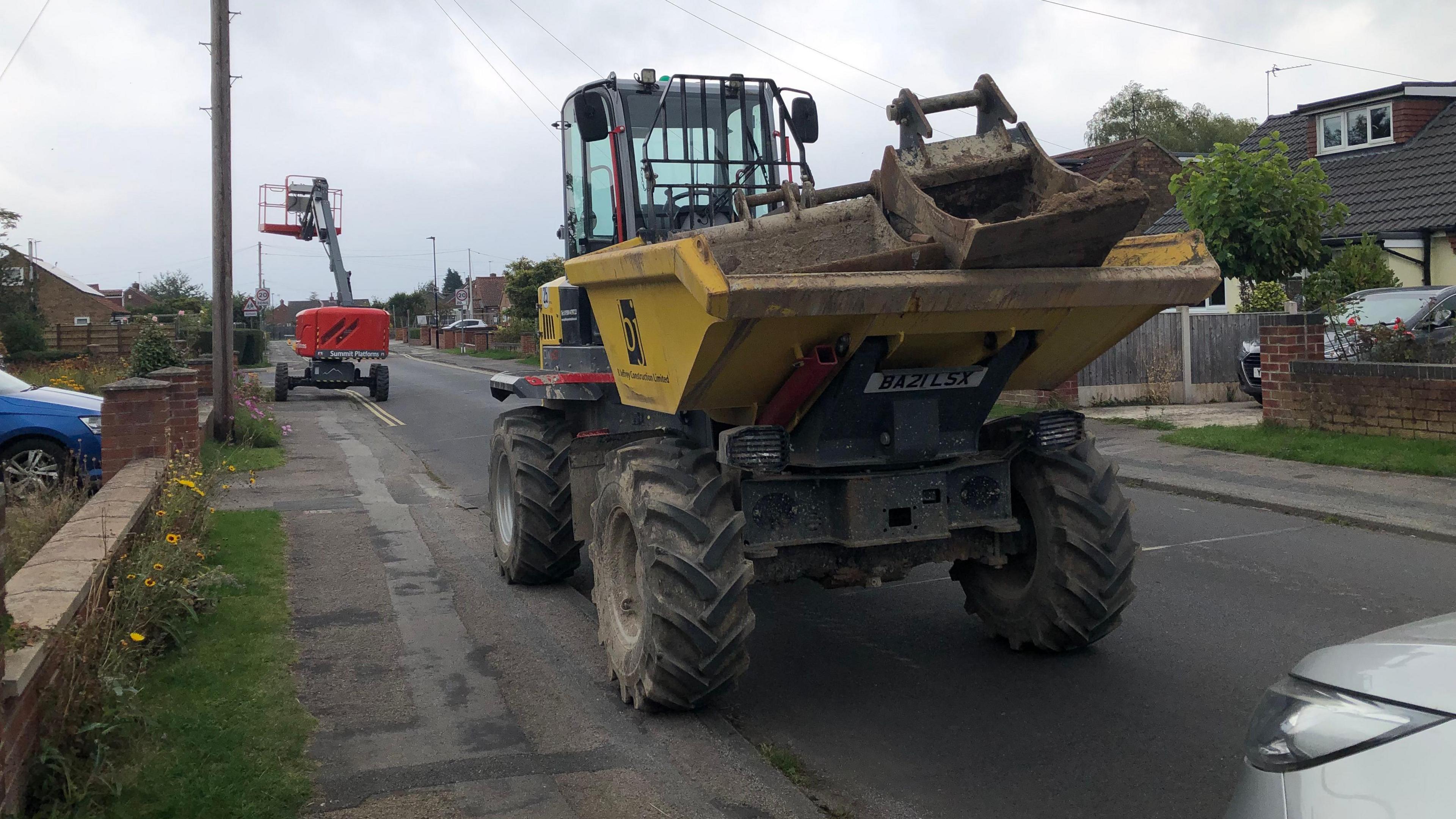 Digger on road