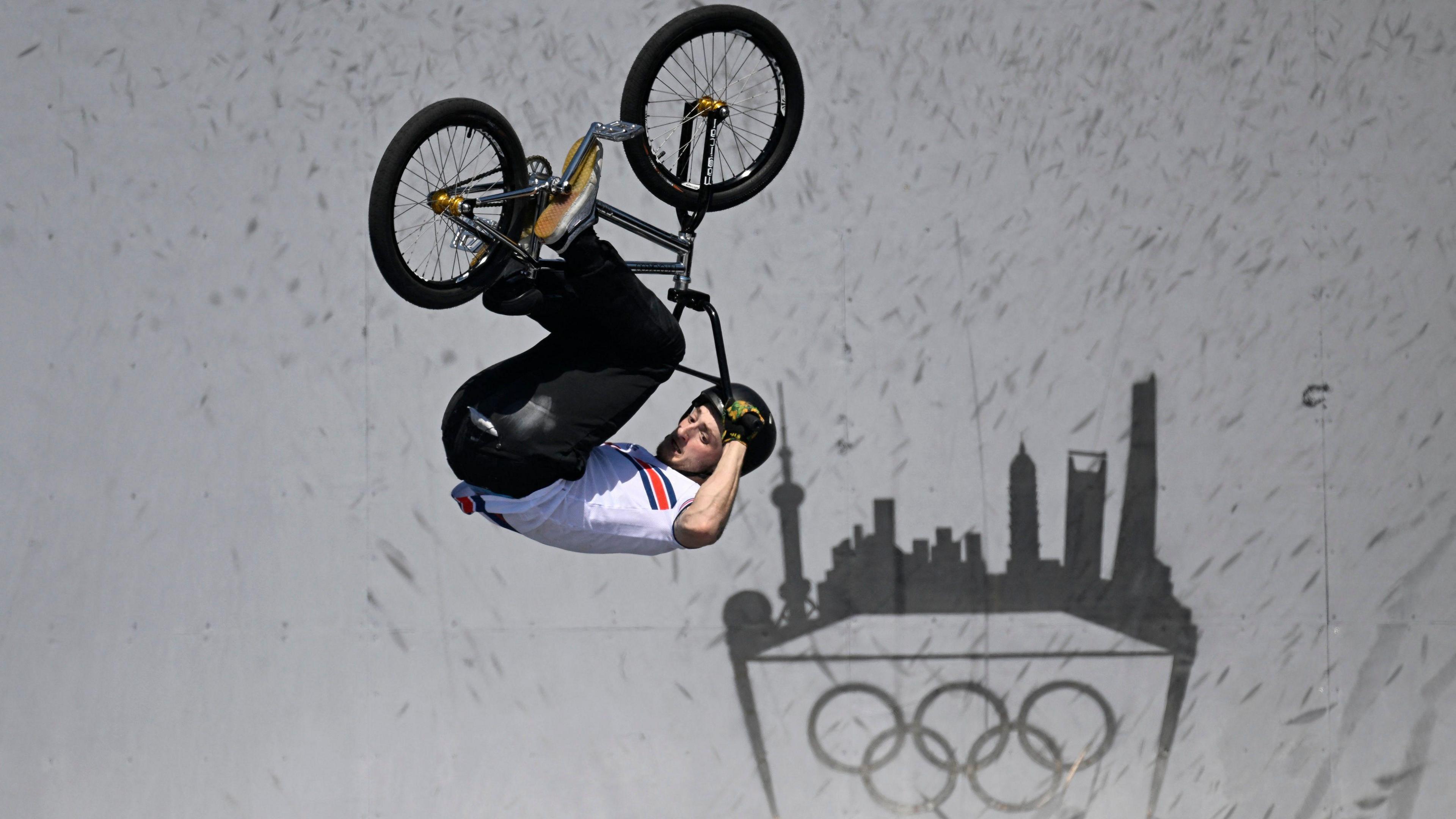 Jude Jones pulling of a backflip on his BMX during a qualifying event for the 2024 Olympic Games