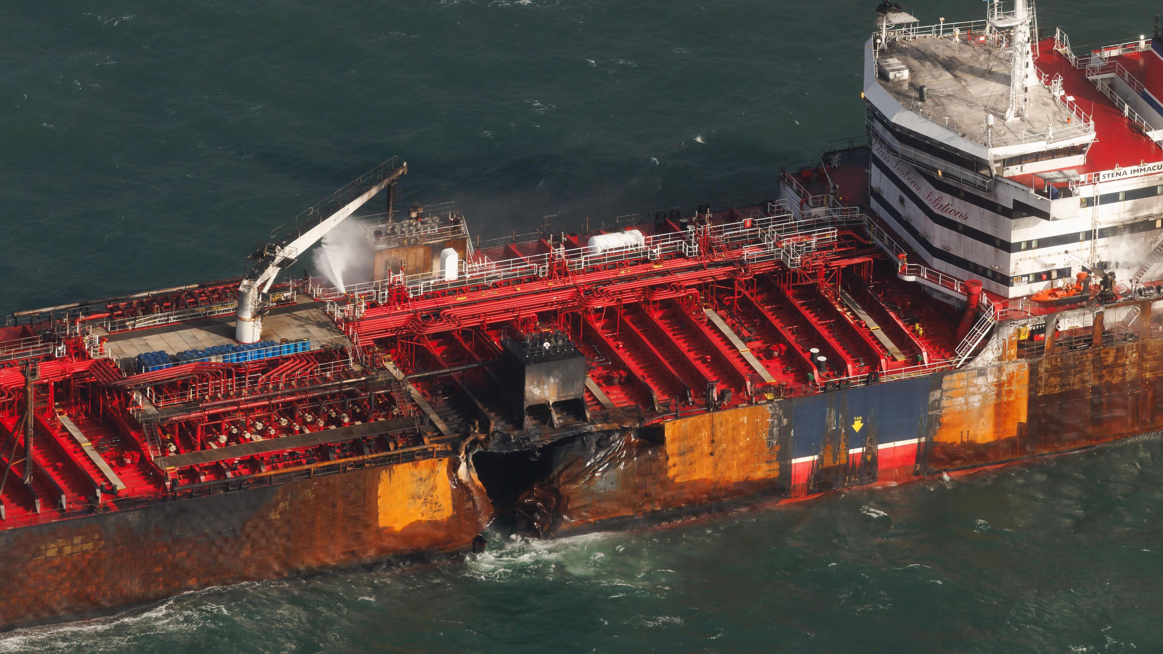 There is a large hole in the side of the Stena Immaculate, but the rest of it looks in better condition than the cargo ship.