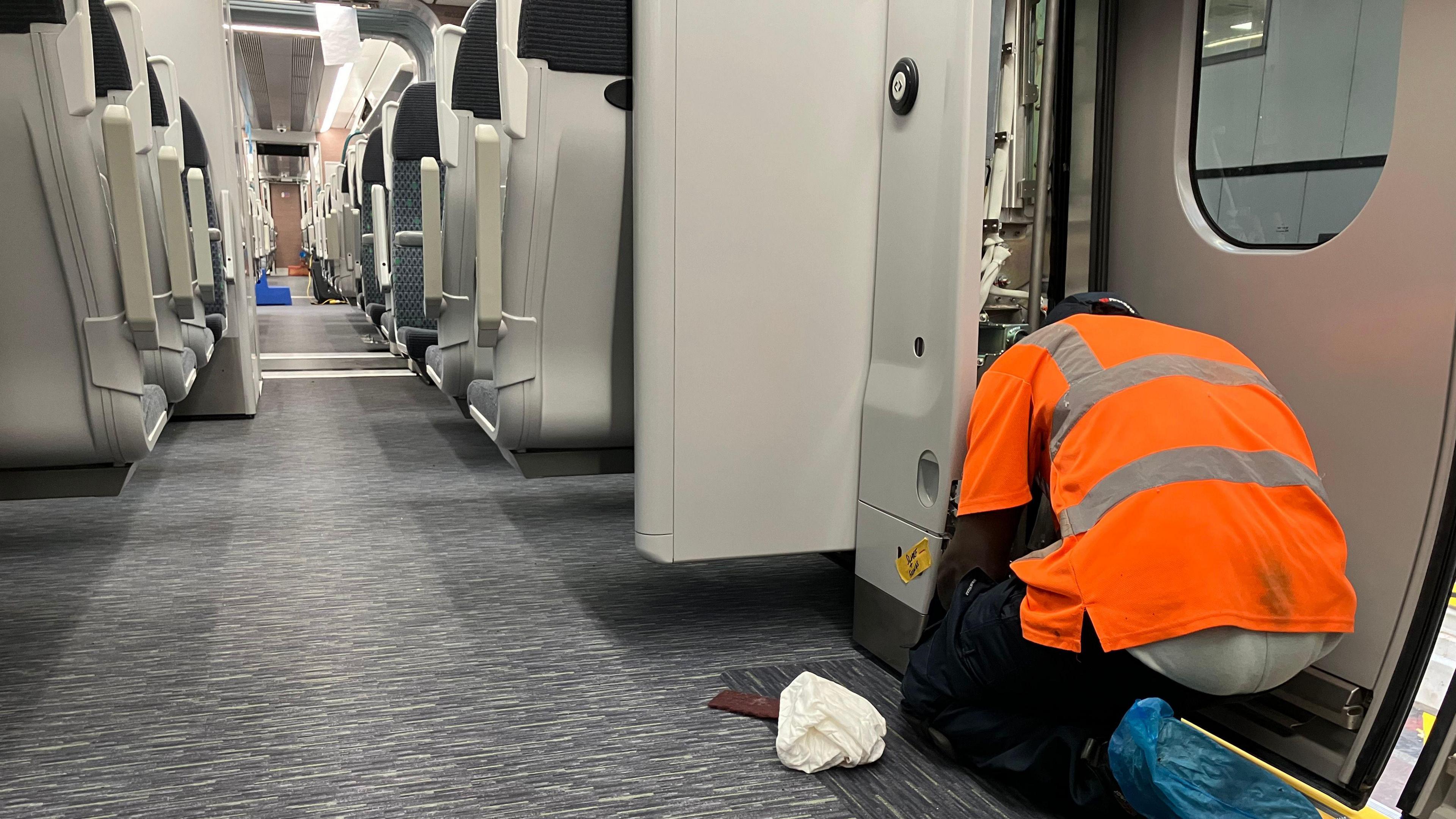 Work taking place on the inside of a train at the Alstom factory 