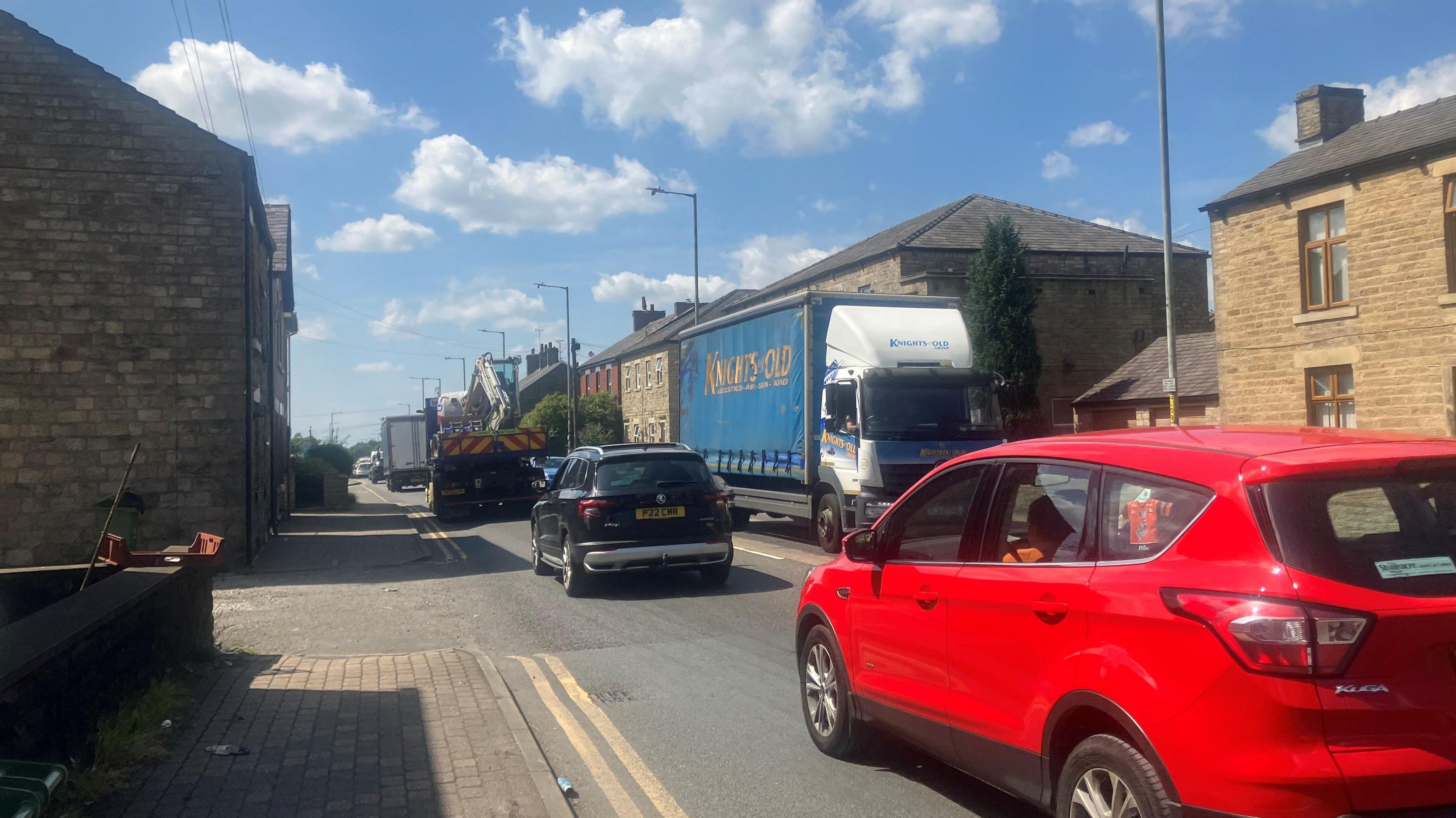 Traffic builds up in a road in Mottram