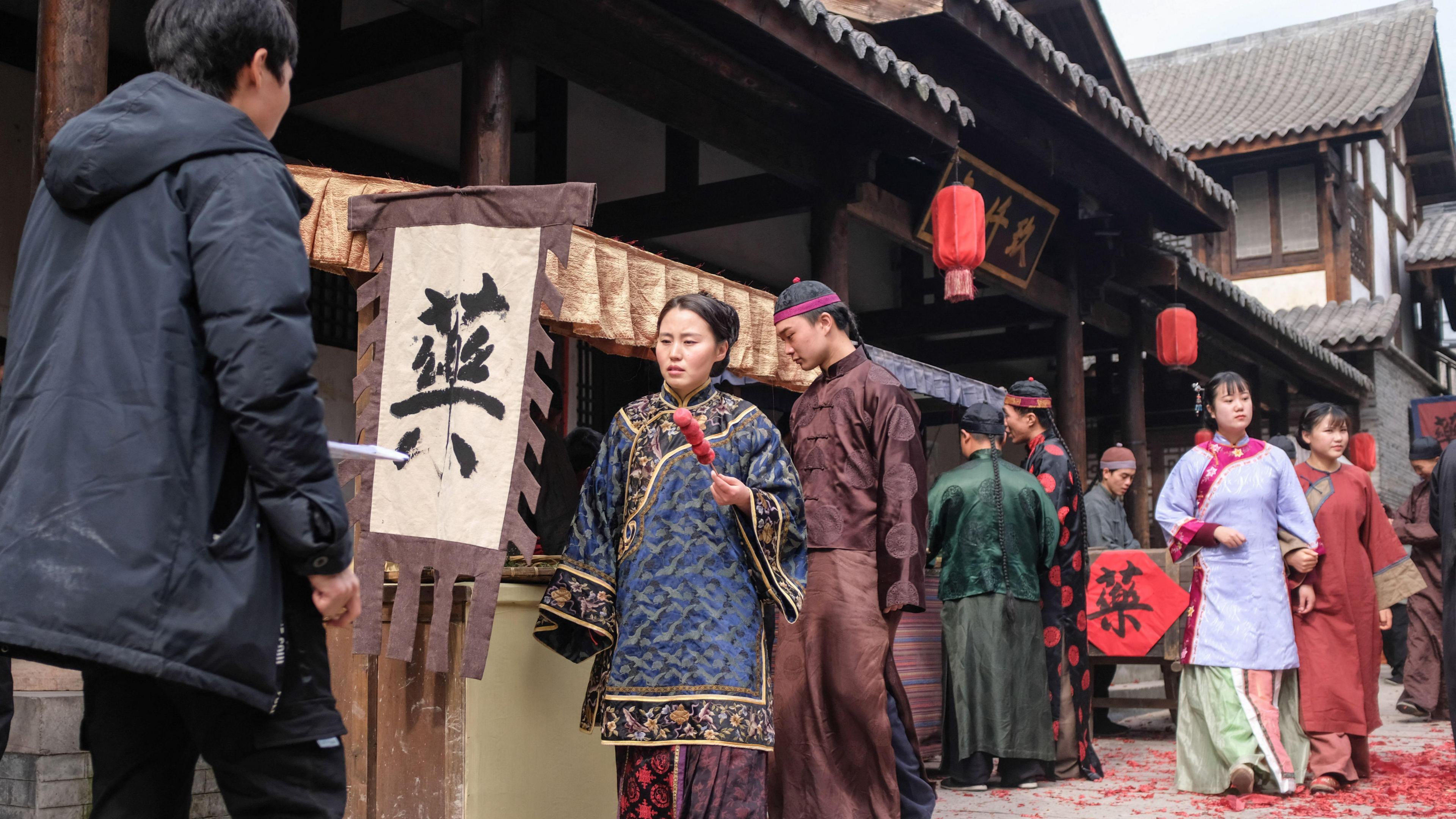 Many young graduates travel to Hengdian to work as movie extras in the studios' productions