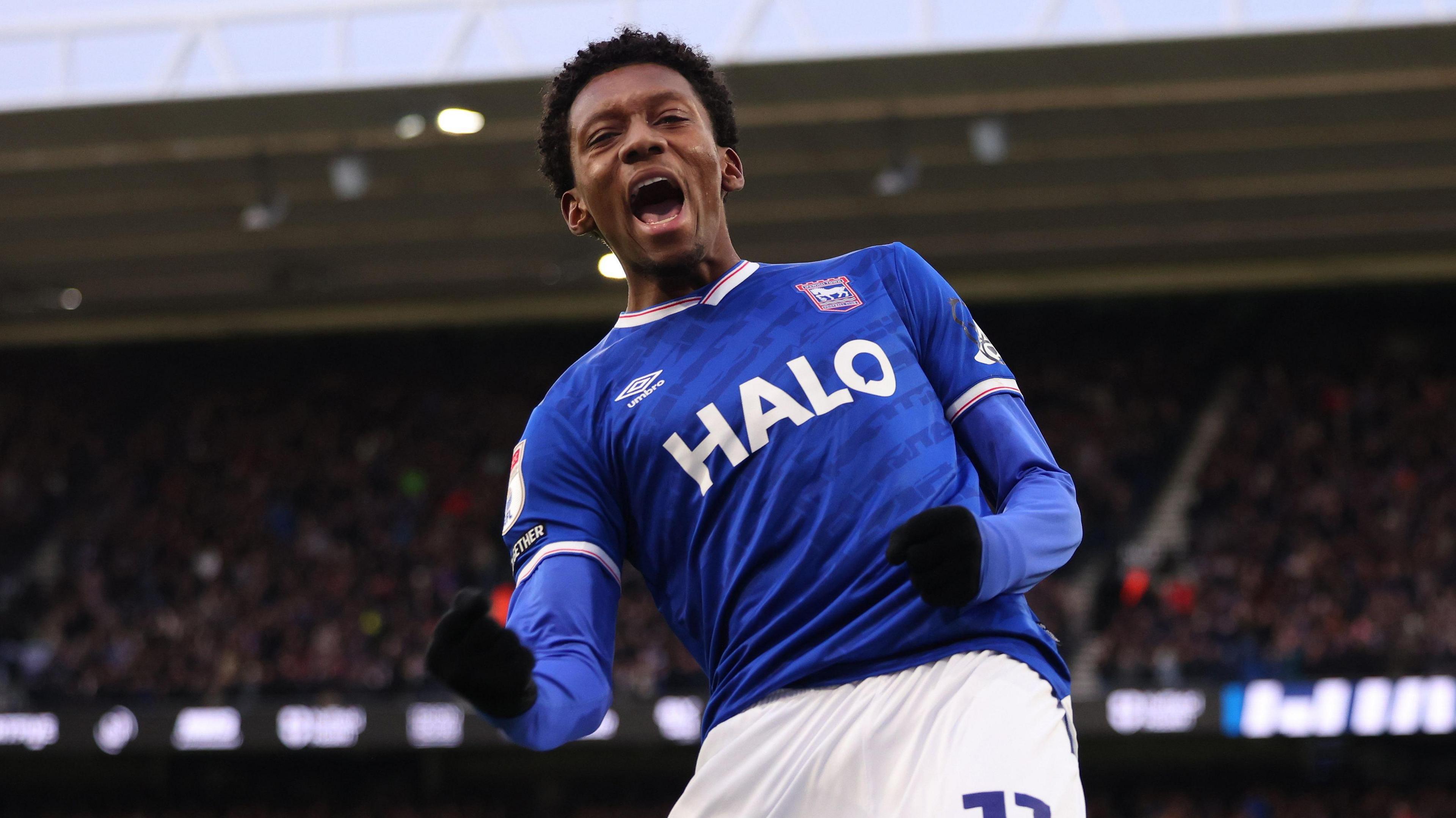 Jaden Philogene celebrating scoring a goal for Ipswich Town
