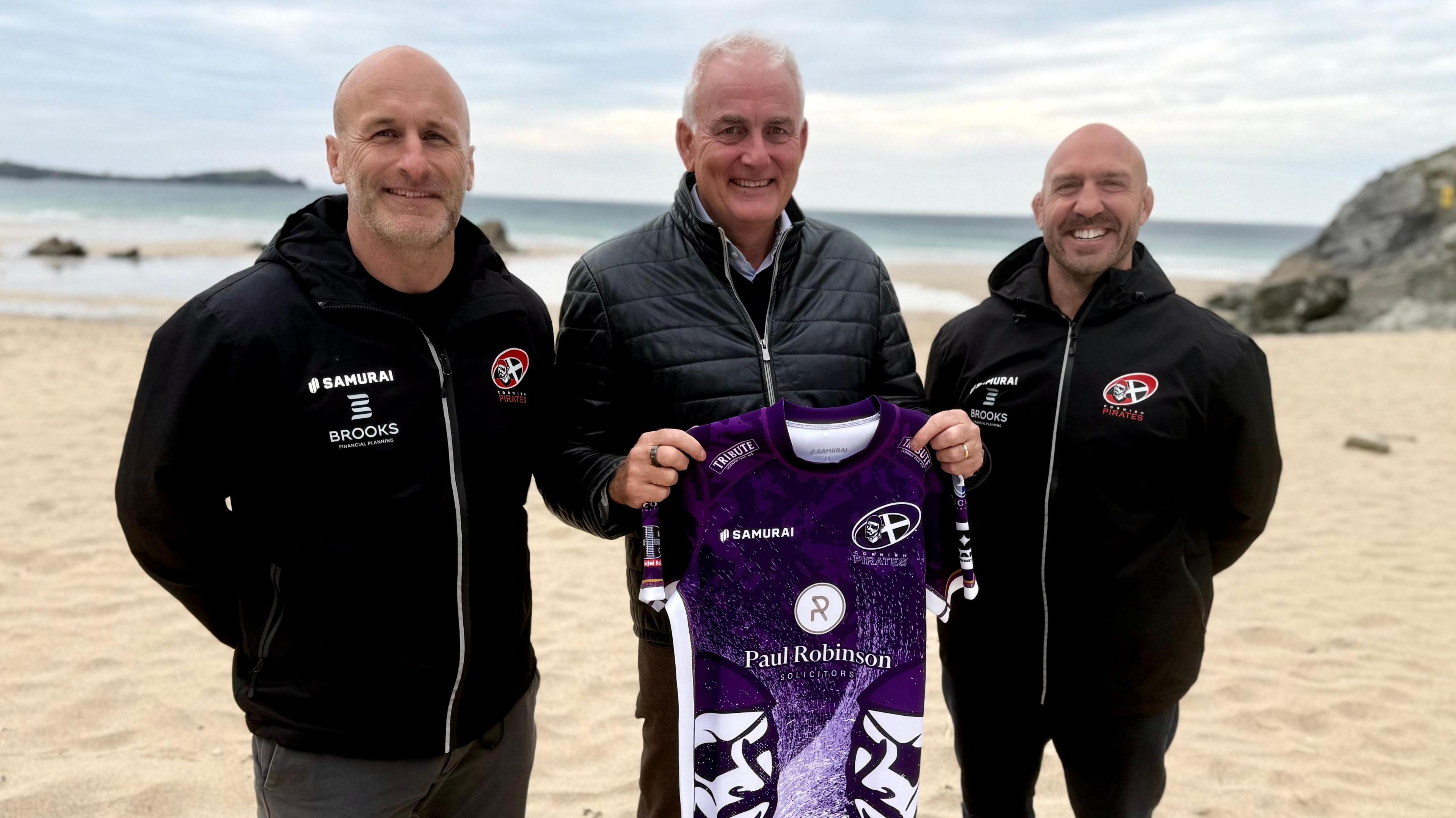 Richard Wastnage (centre) is welcomed to the club by joint-head coaches Gavin Cattle (left) and Alan Paver