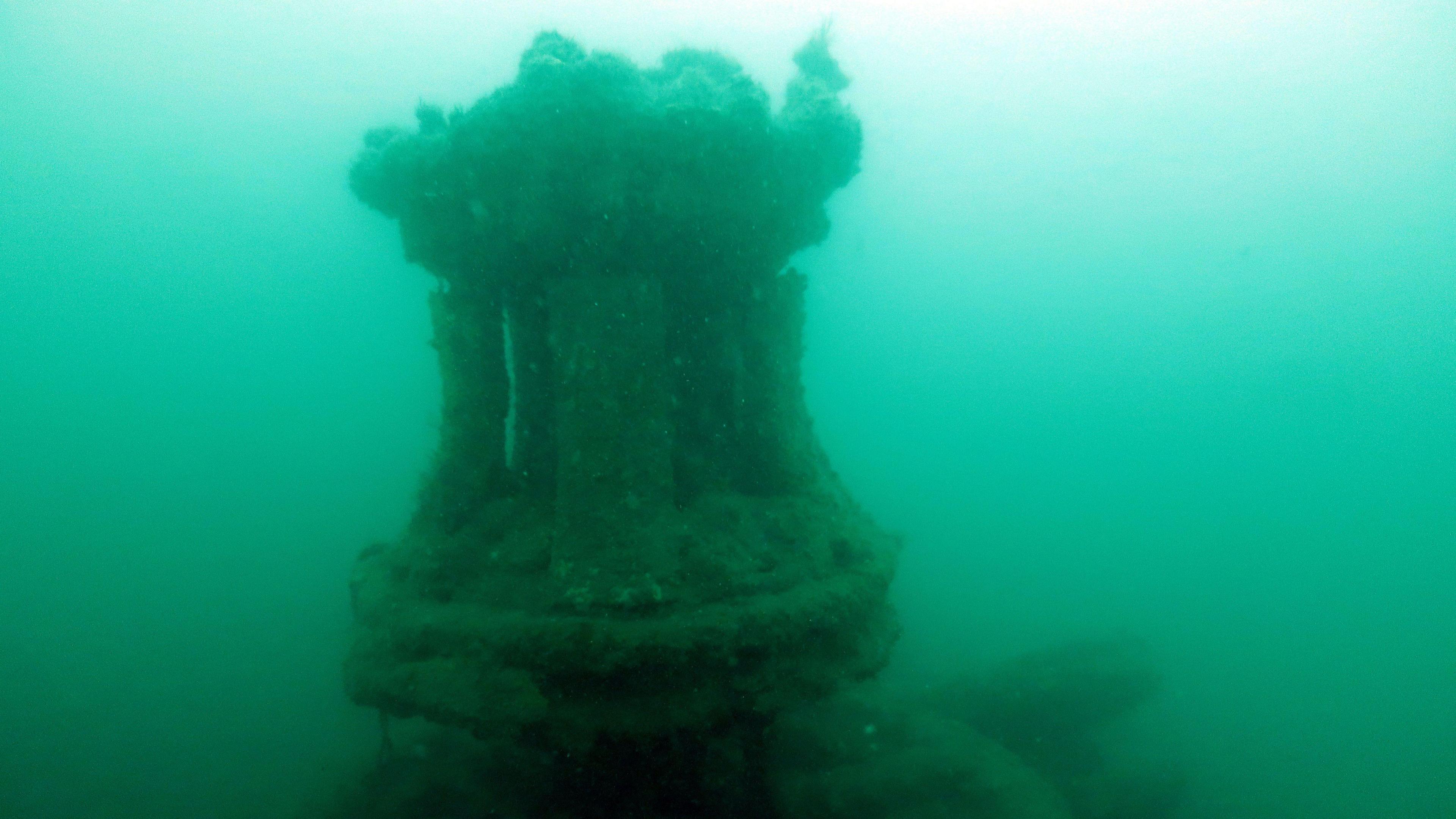 Underwater image of a capstan on a wreck on the seabed