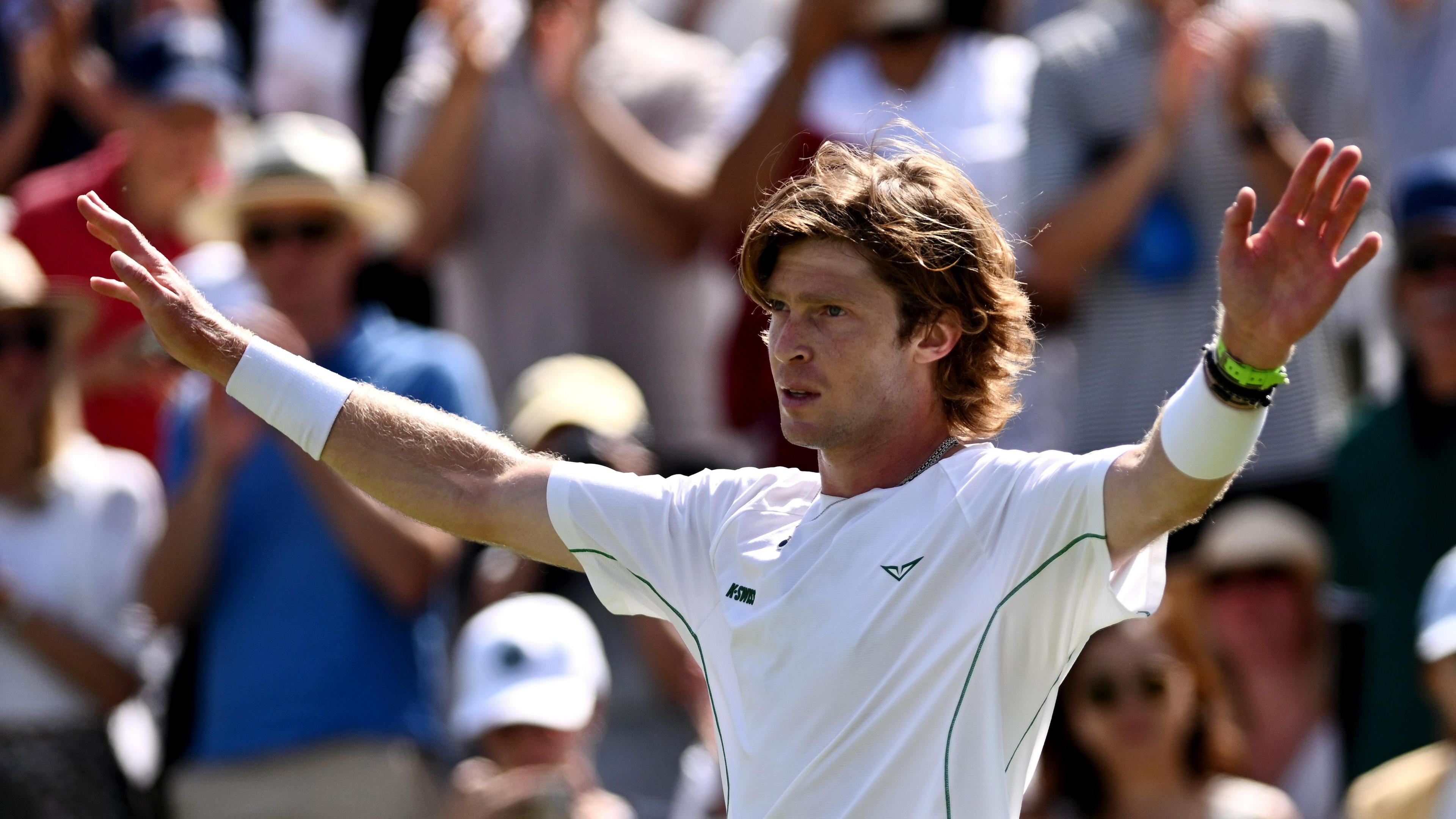 Andrey Rublev celebrates victory in round three at Wimbledon