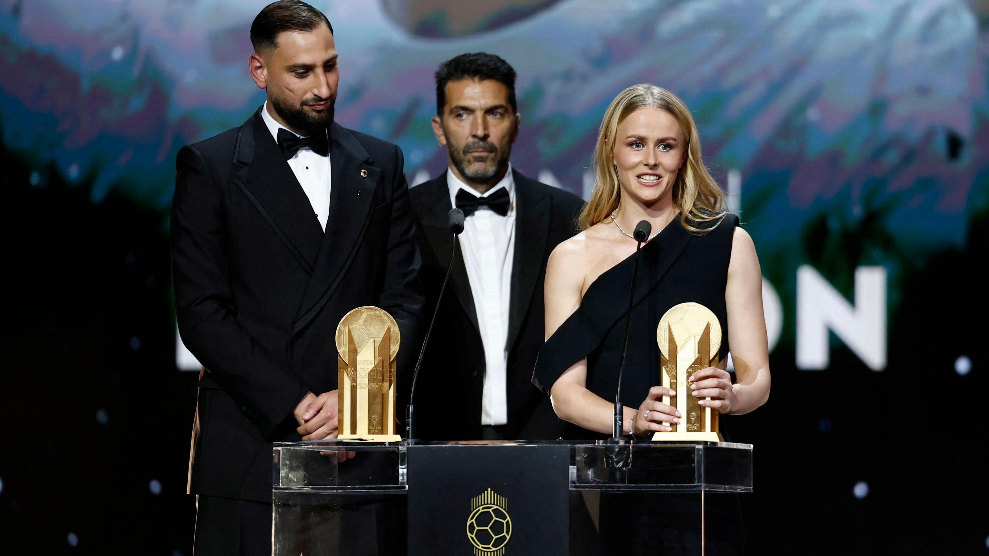 Manchester City's Gianluigi Donnarumma and Chelsea's Hannah Hampton after winning the men's and women's Yashin Trophy 