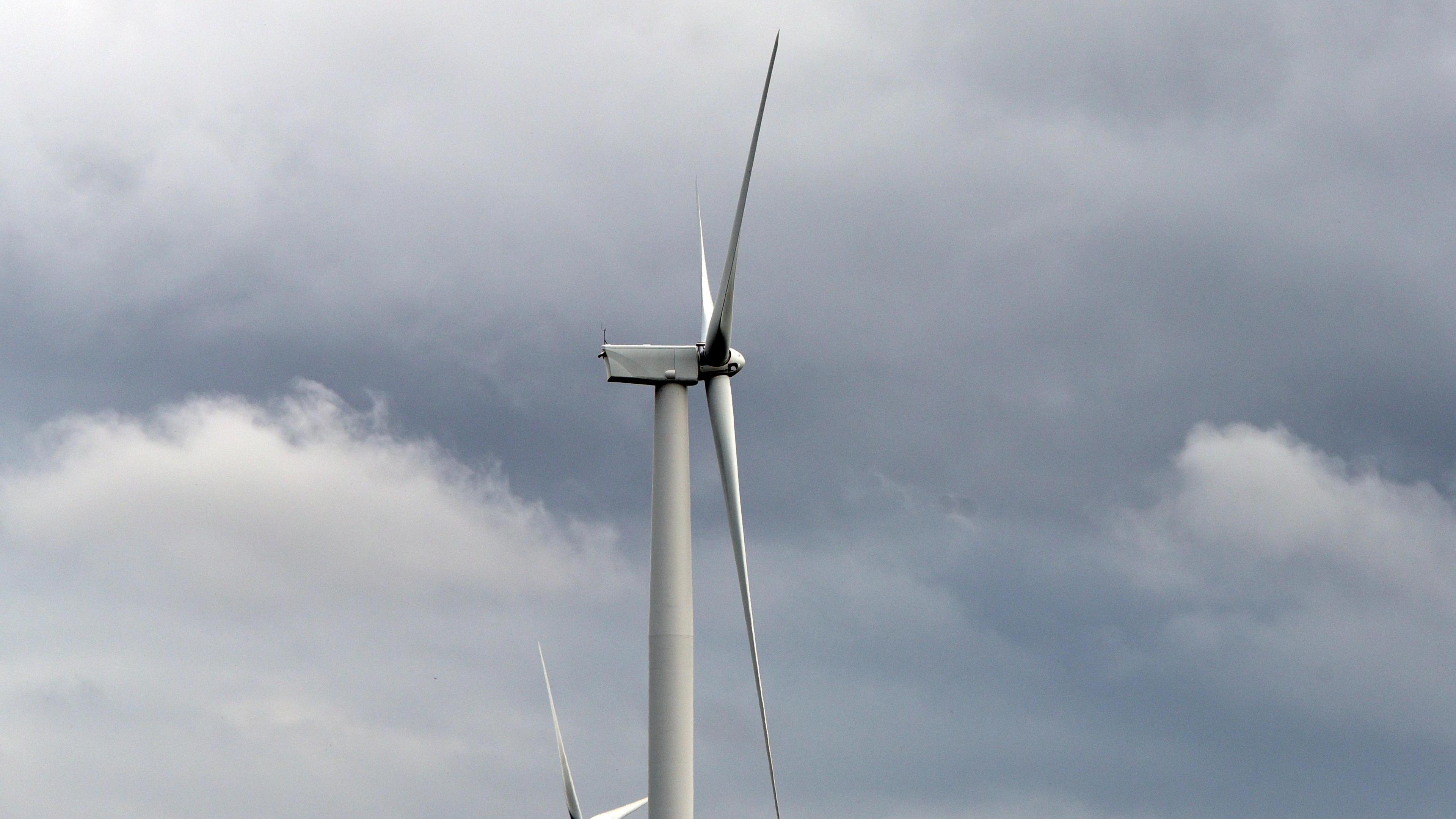 A wind turbine on an overcast day