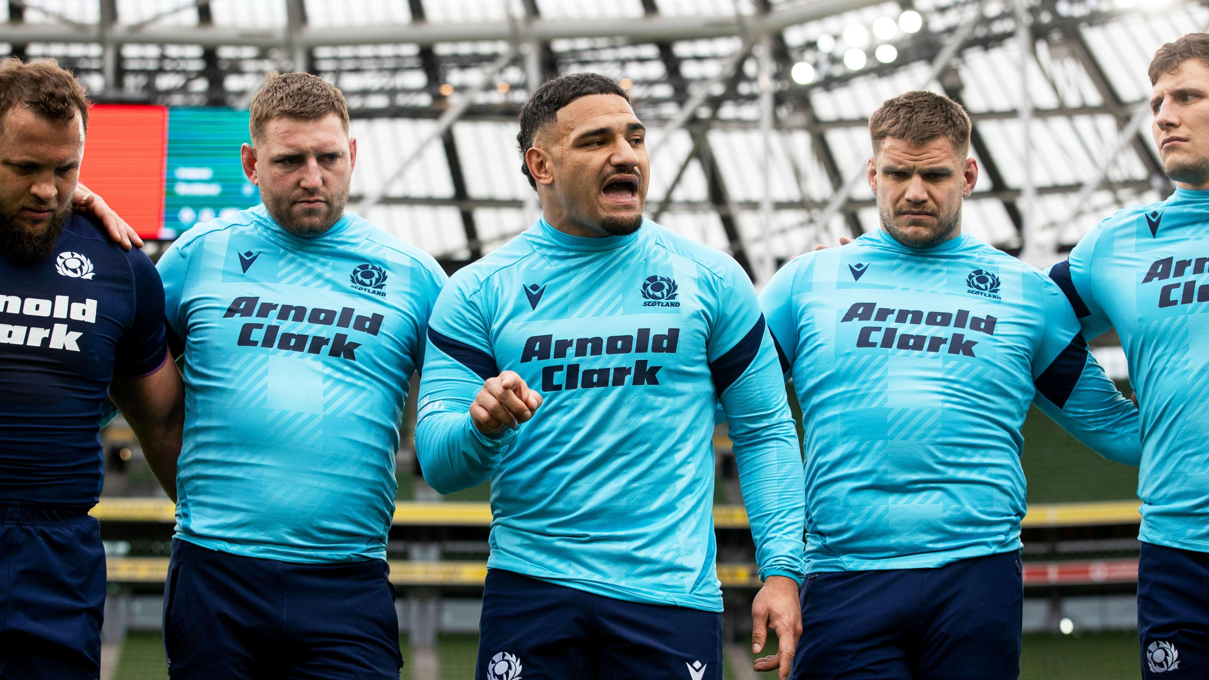 Scotland captain Sione Tuipulotu gives a talk to his team in Dublin