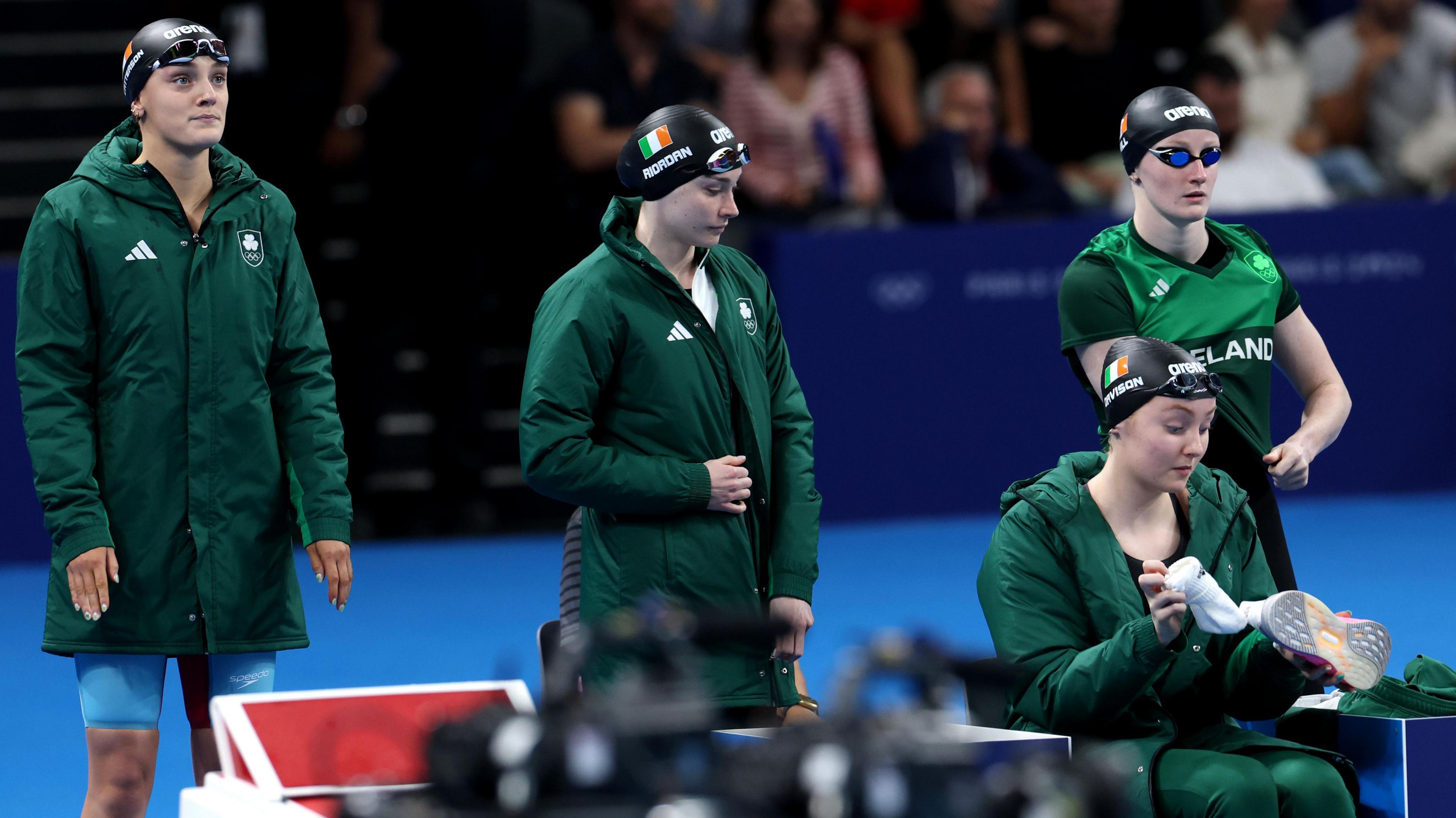 Victoria Catterson, Erin Riordan, Danielle Hill and Davison swam in an atmospheric arena. 