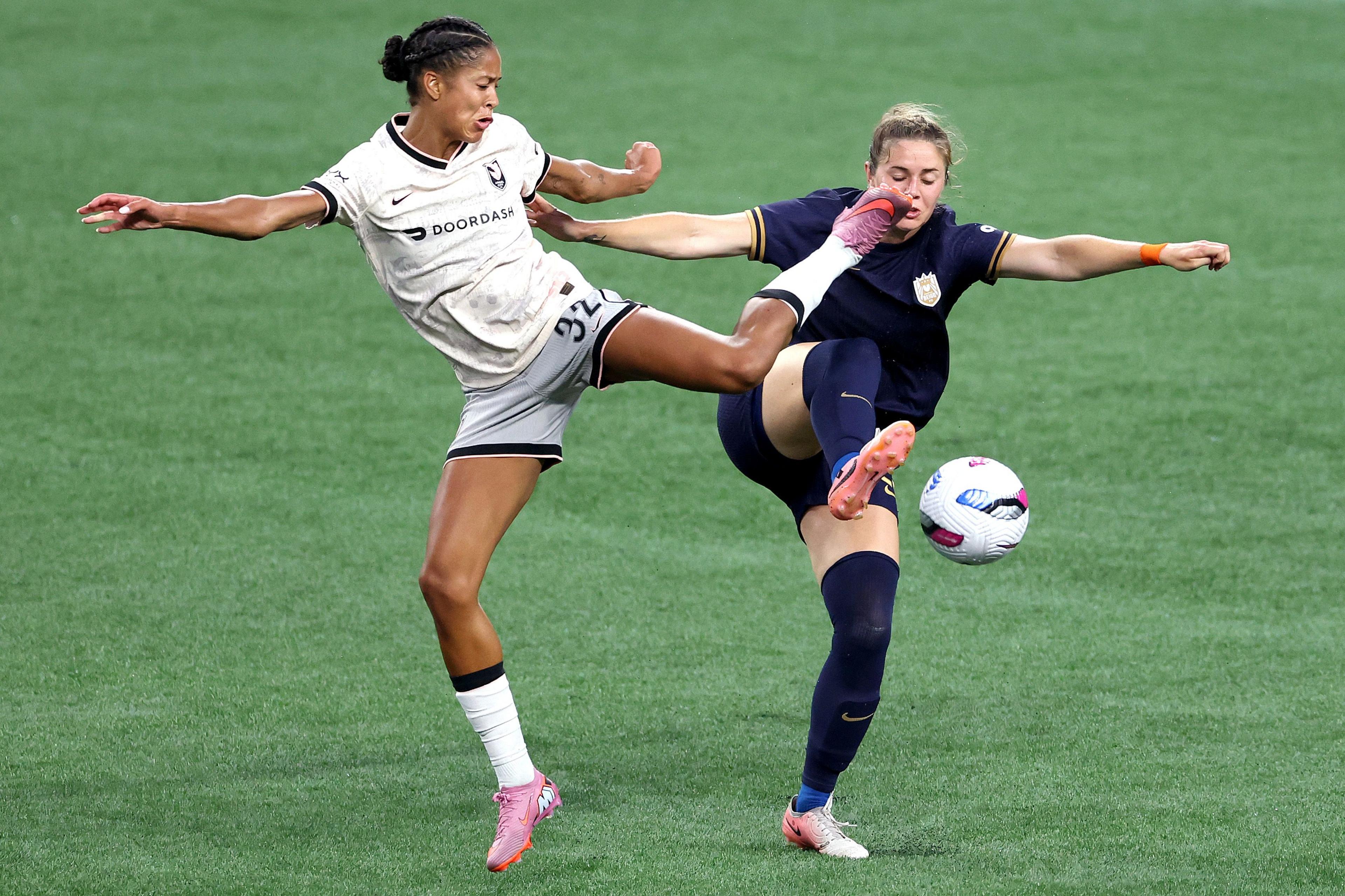 Angel City's Sveindís Jane Jónsdóttir battles for possession against Seattle Reign's Shae Holmes during the NWSL match at Lumen Field in Seattle, Washington. Photo by Steph Chambers