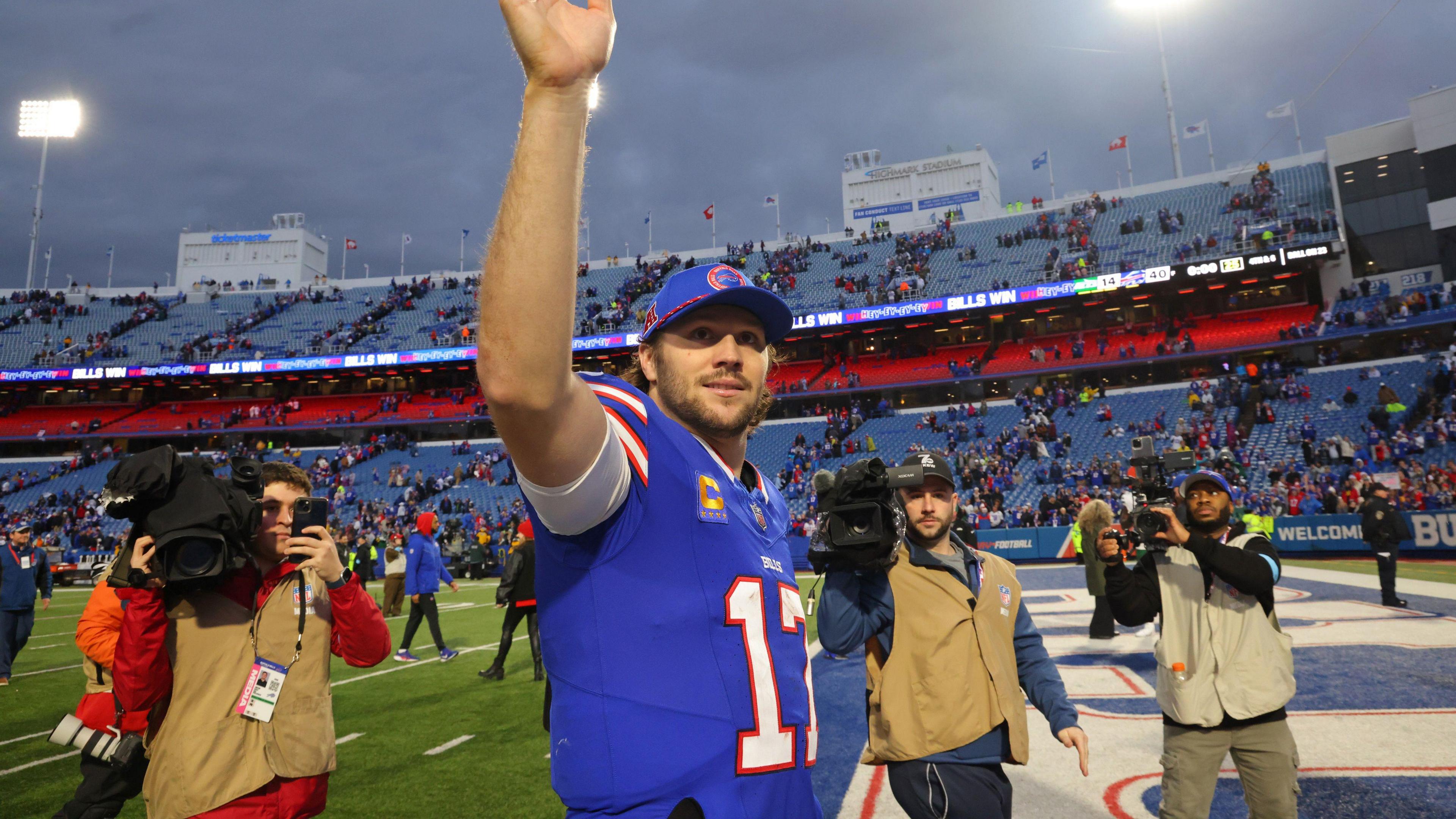 Buffalo Bills quarterback Josh Allen waves to the crowd after another win