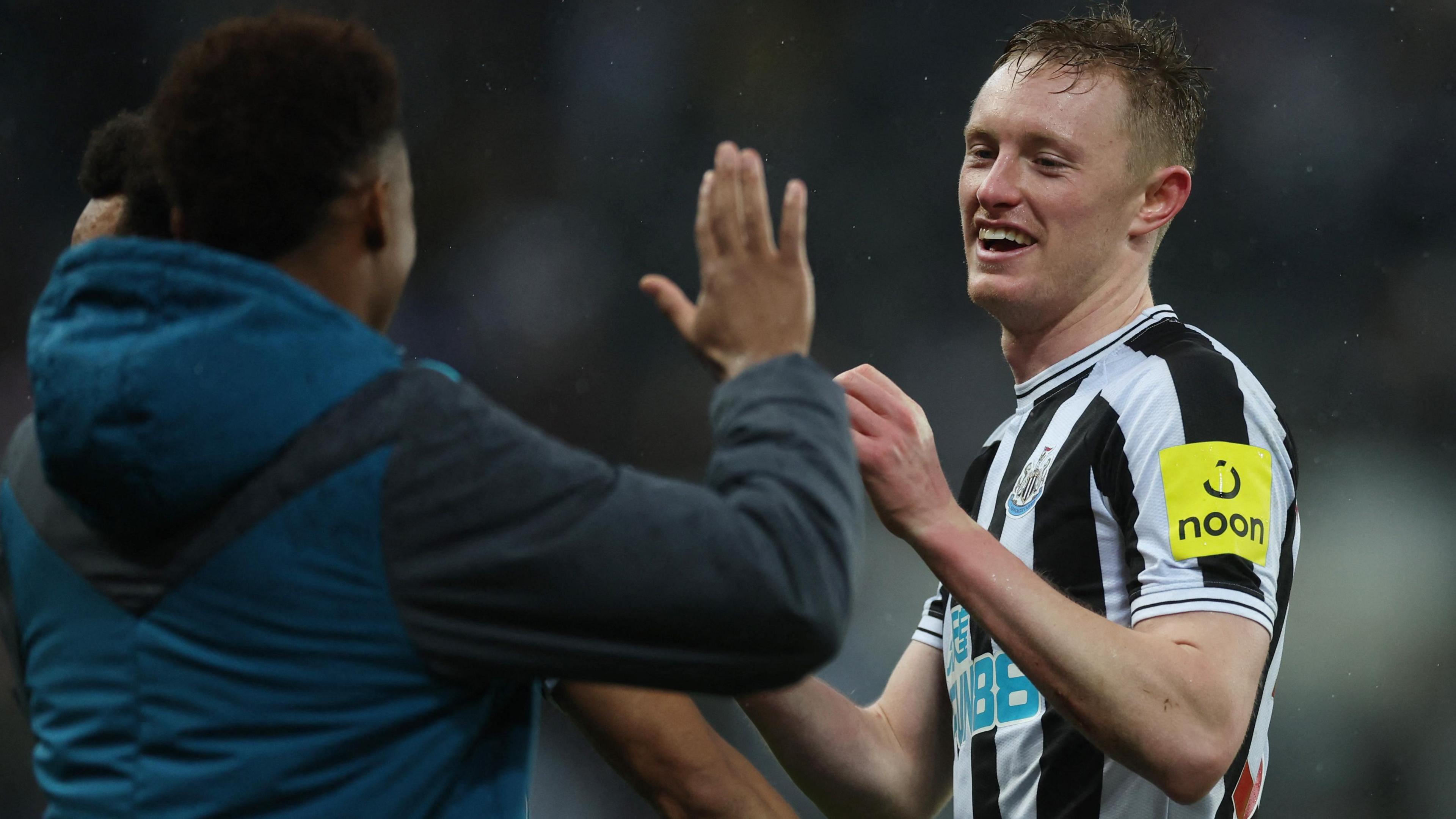 Sean Longstaff celebrates a Newcastle victory