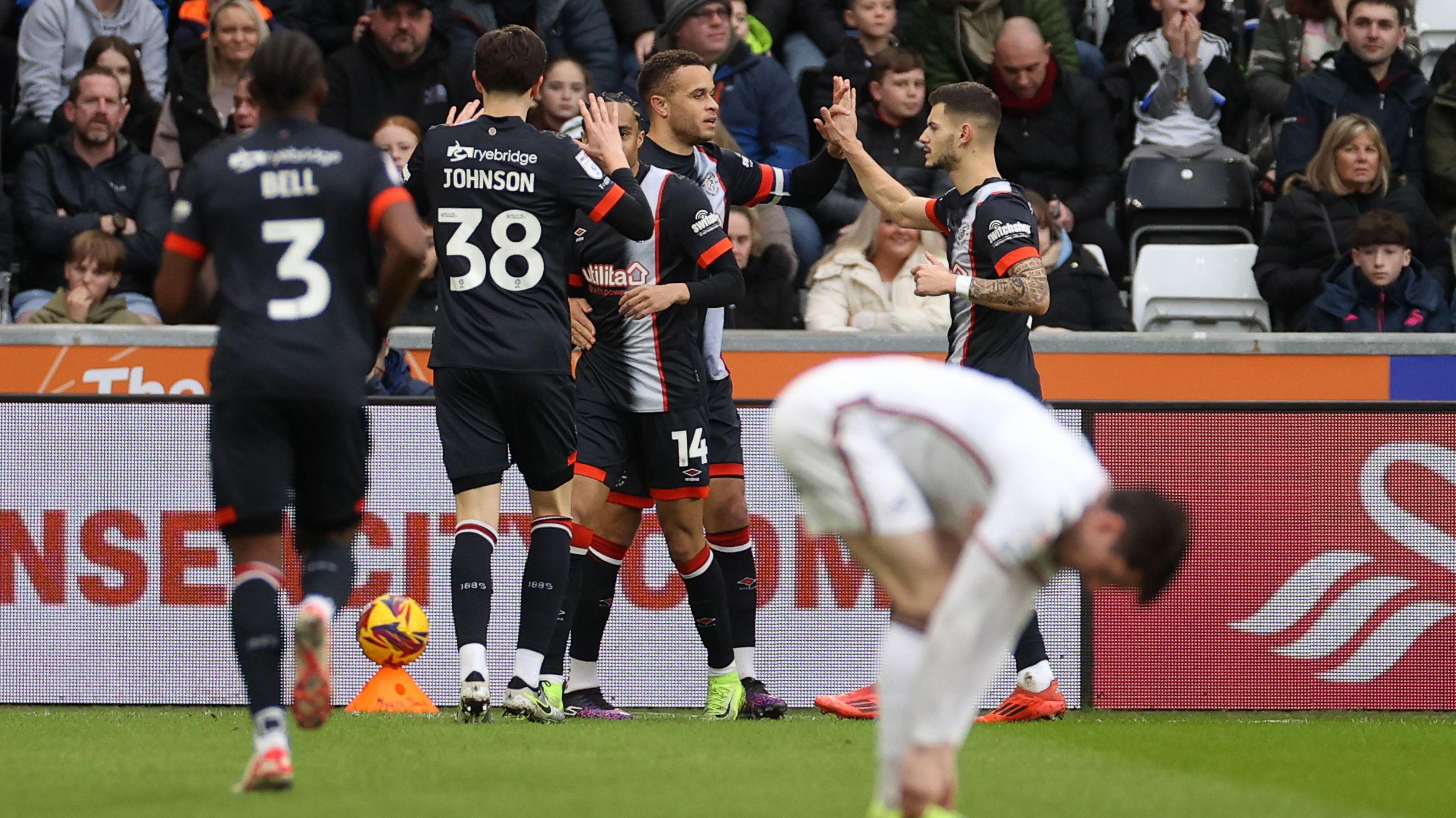 Luton celebrate their early goal 