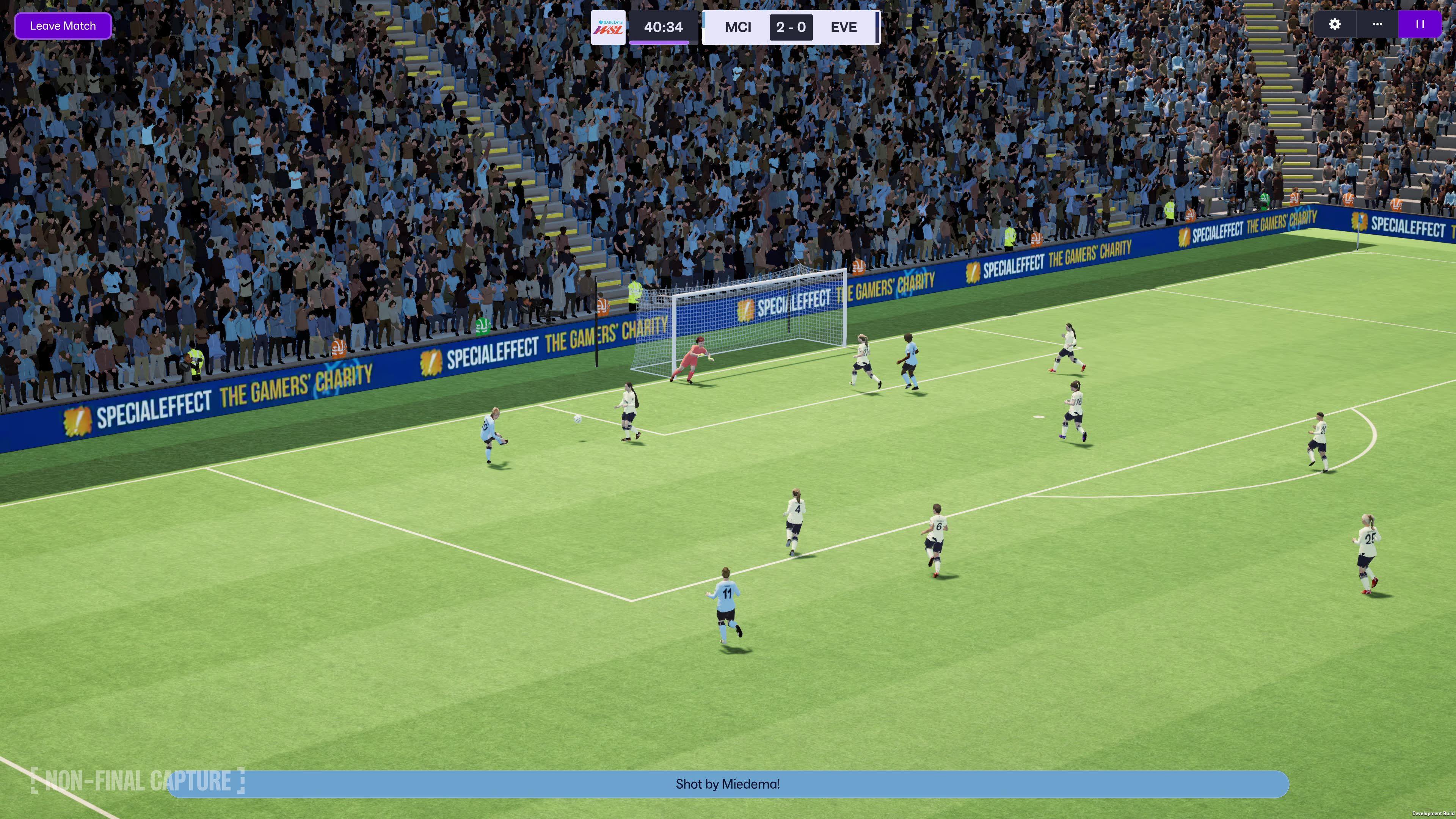 Video game screen grab of players on the pitch surrounding the goal.