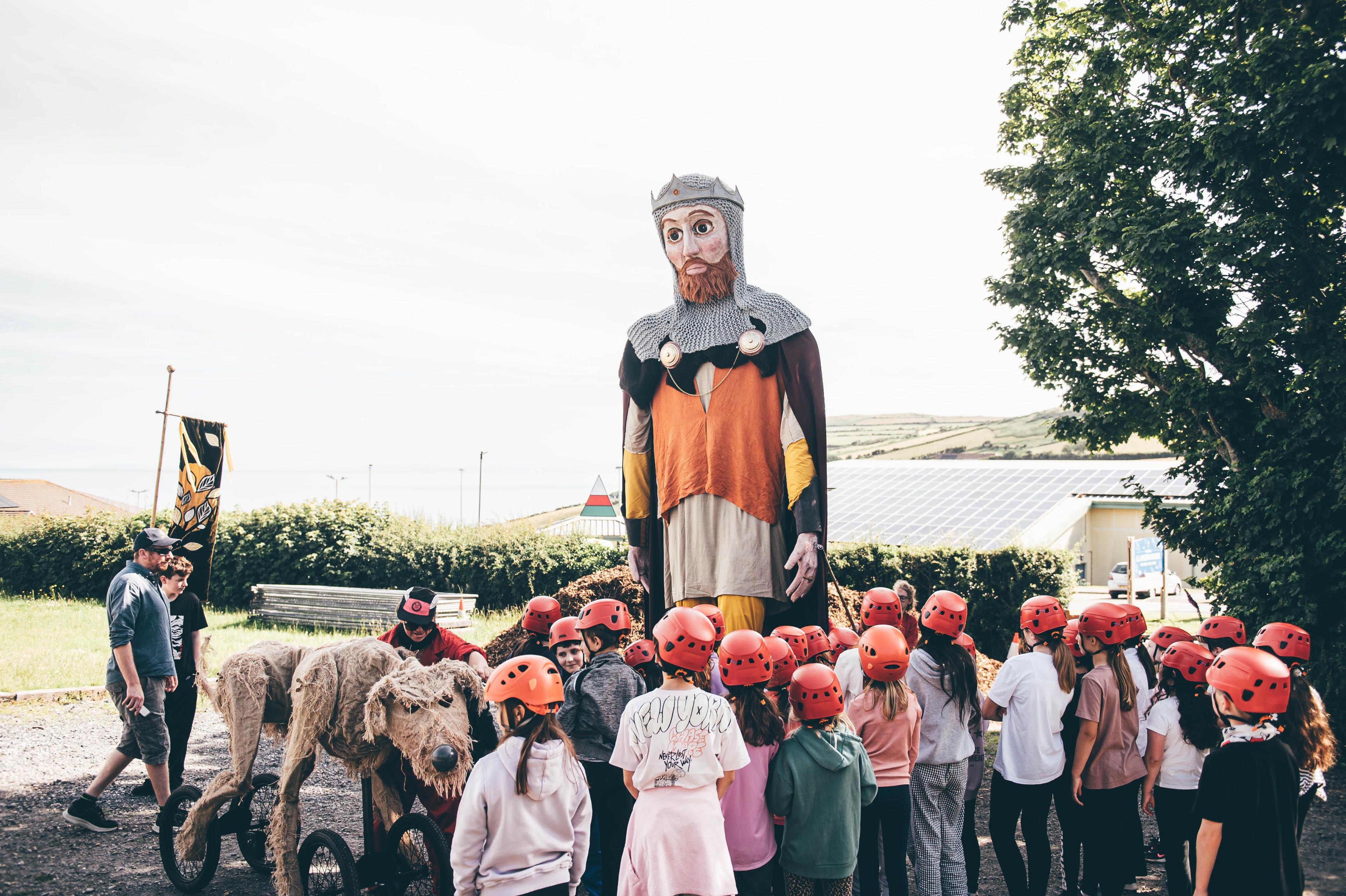 Lord Rhys puppet with dog and children at Llangranog