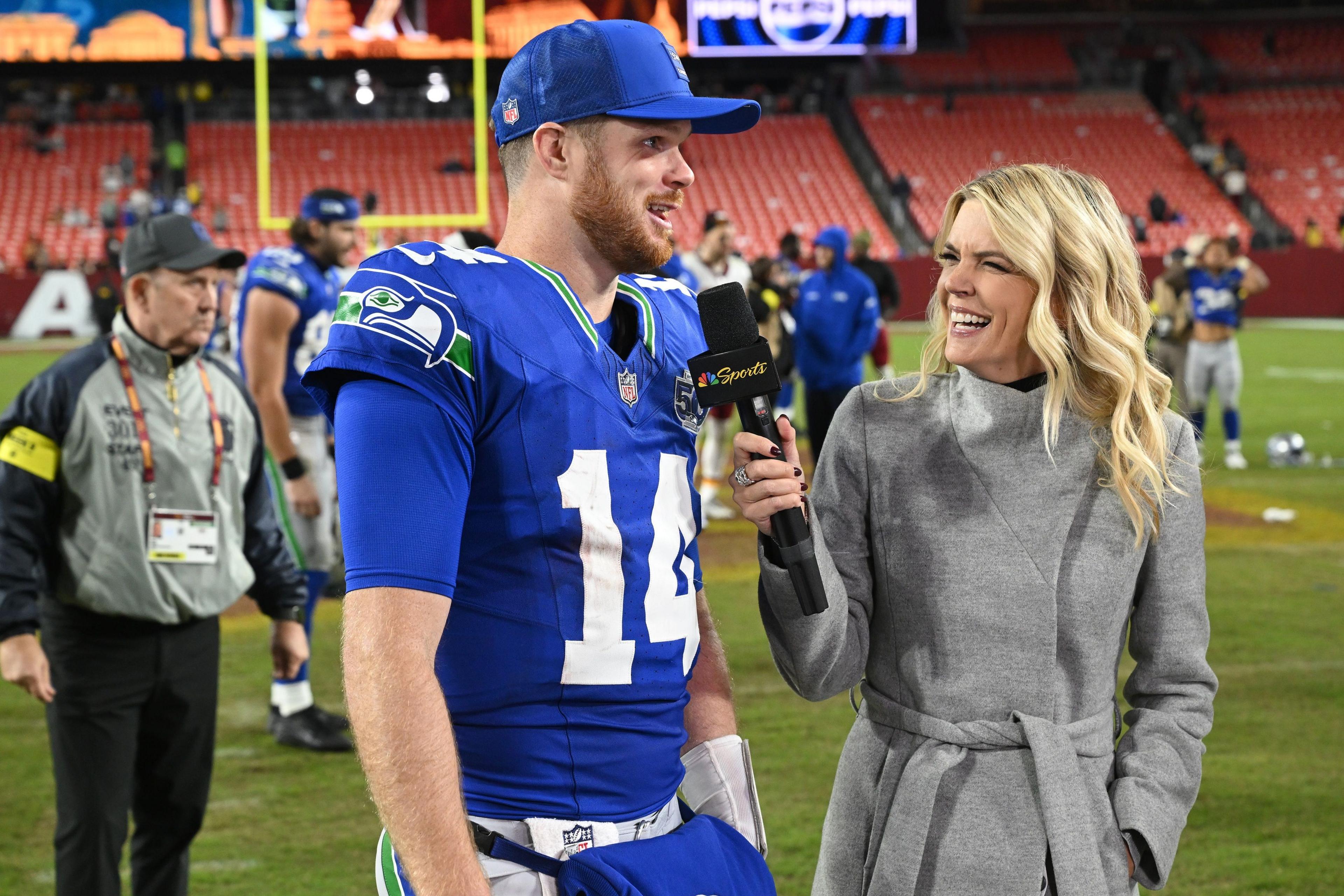 Seattle quarterback Sam Darnold talks after a win