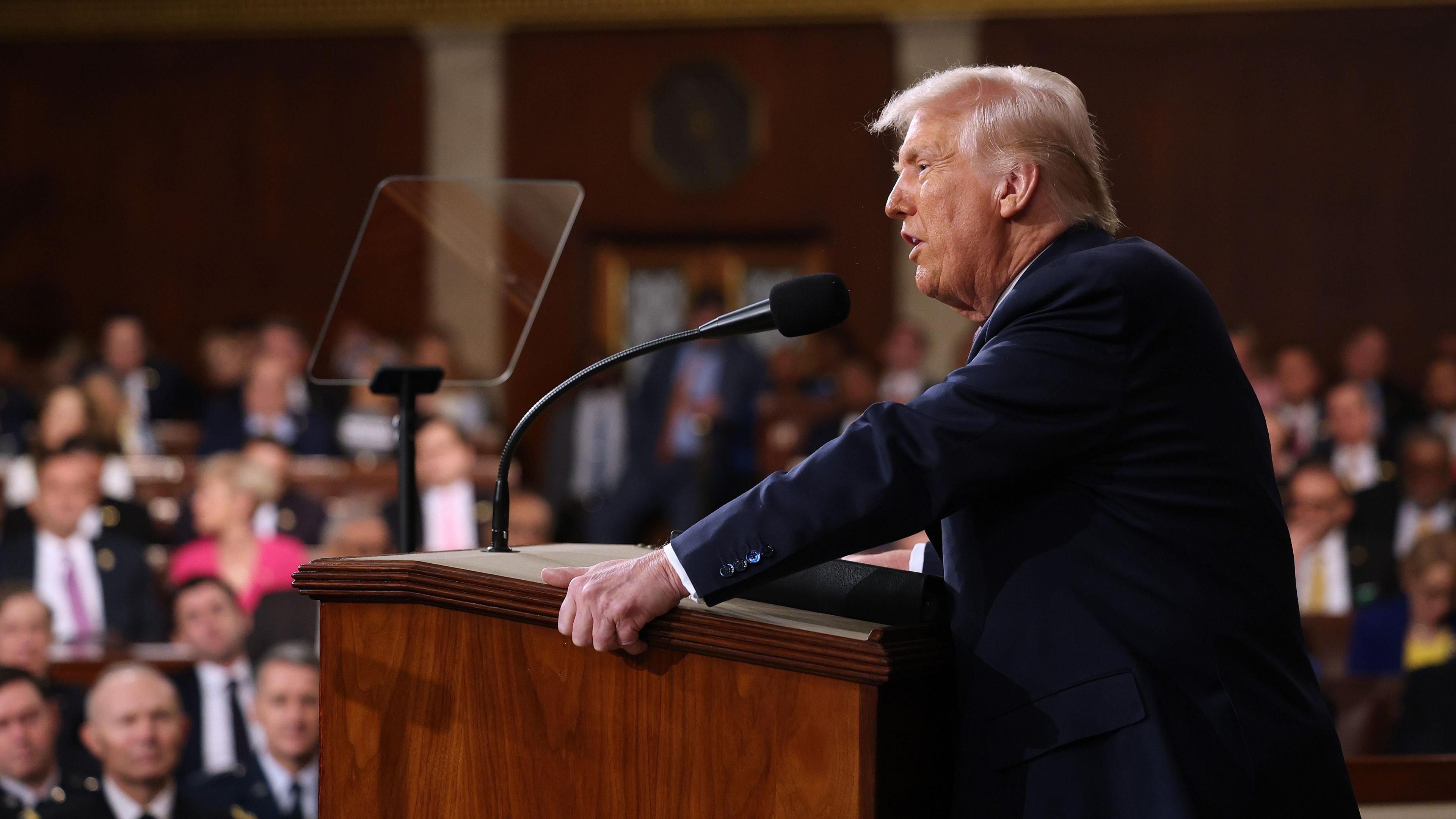 Donald Trump addressing a joint session of Congress at a microphone