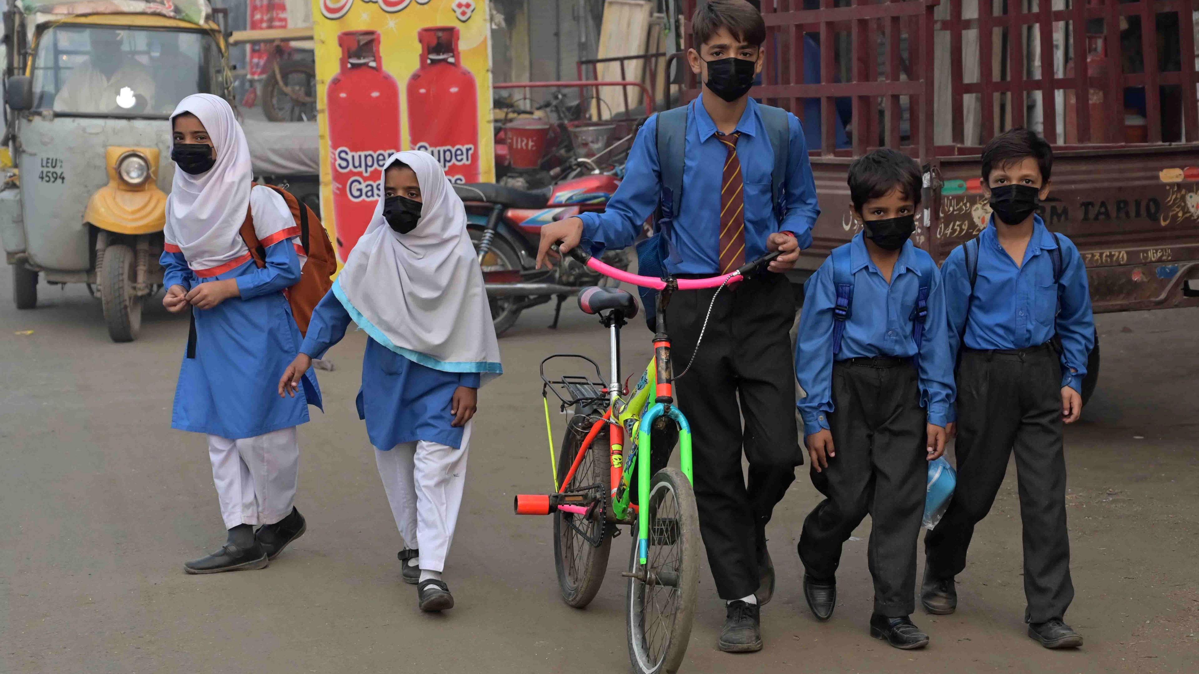 children wearing masks