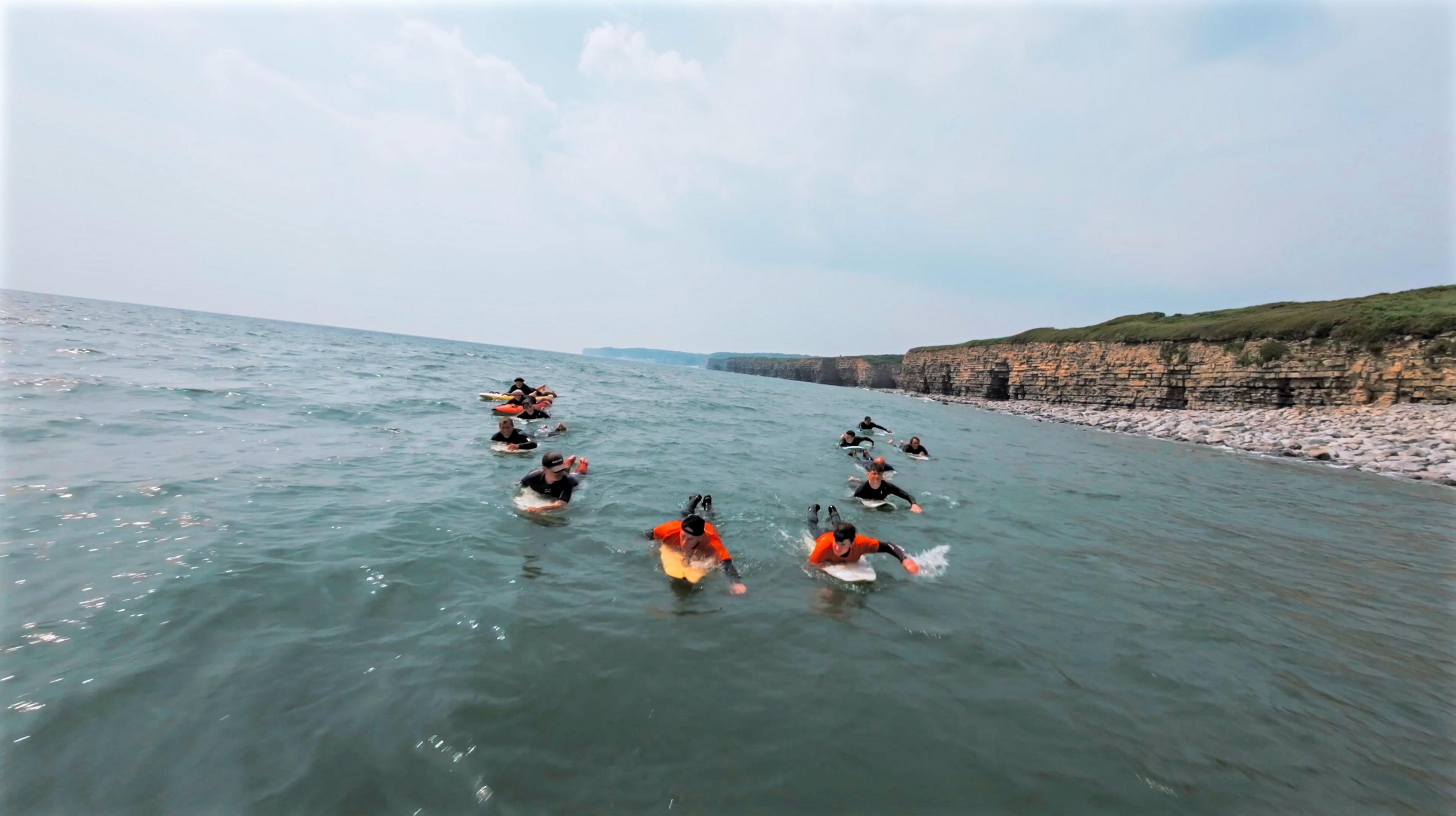 Mark paddling home to Llantwit Major with his surfing friends