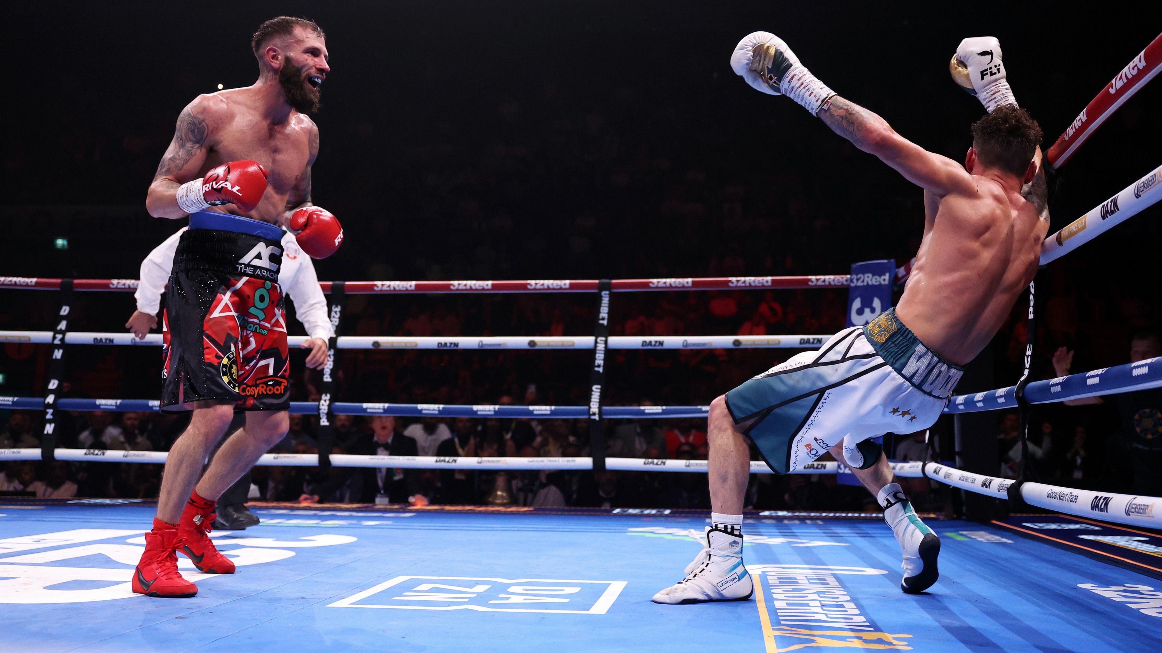 Anthony Cacace knocks Leigh Wood into the ropes