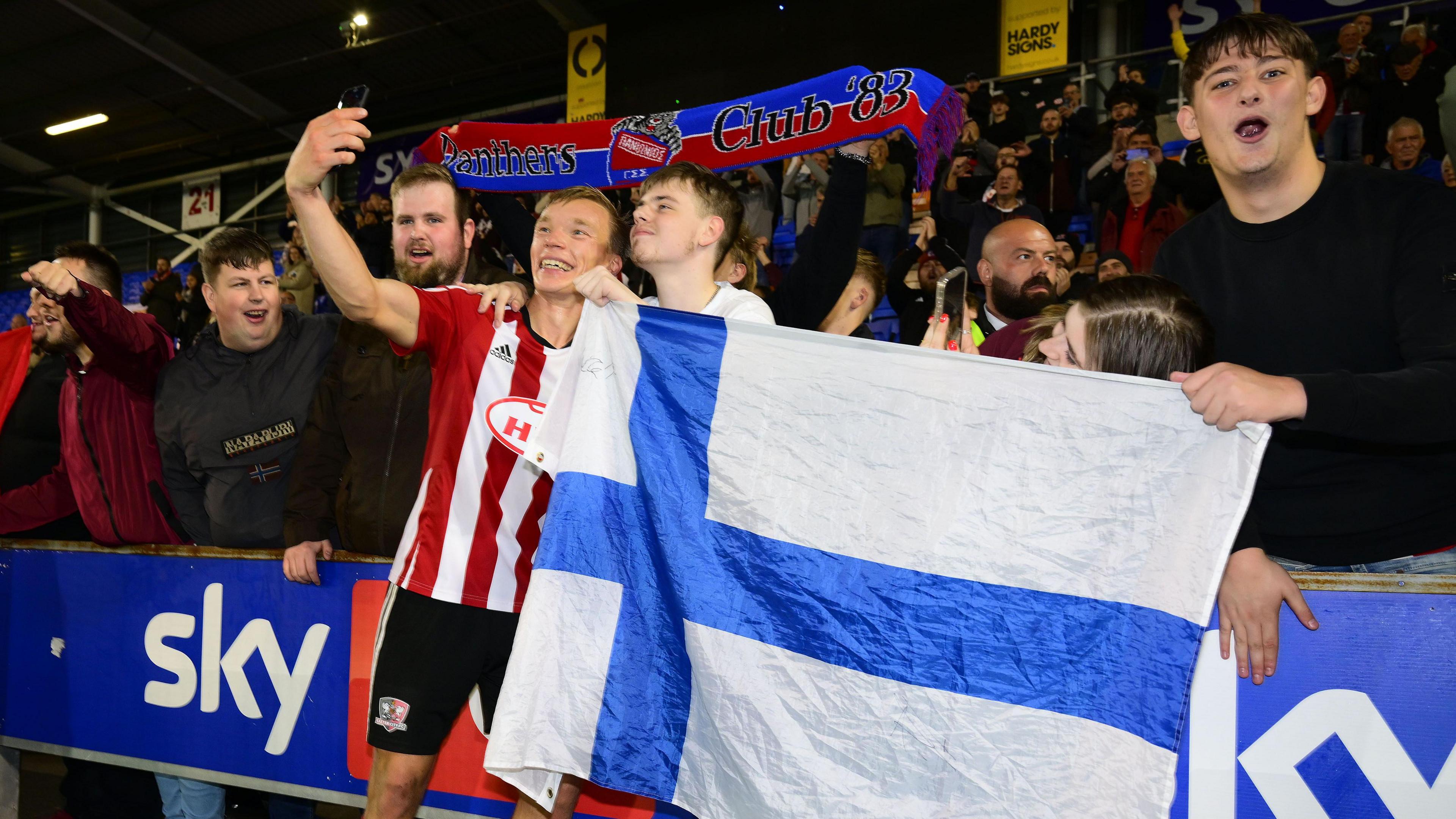 Ilmari Niskanen poses for a selfie with Exeter City fans