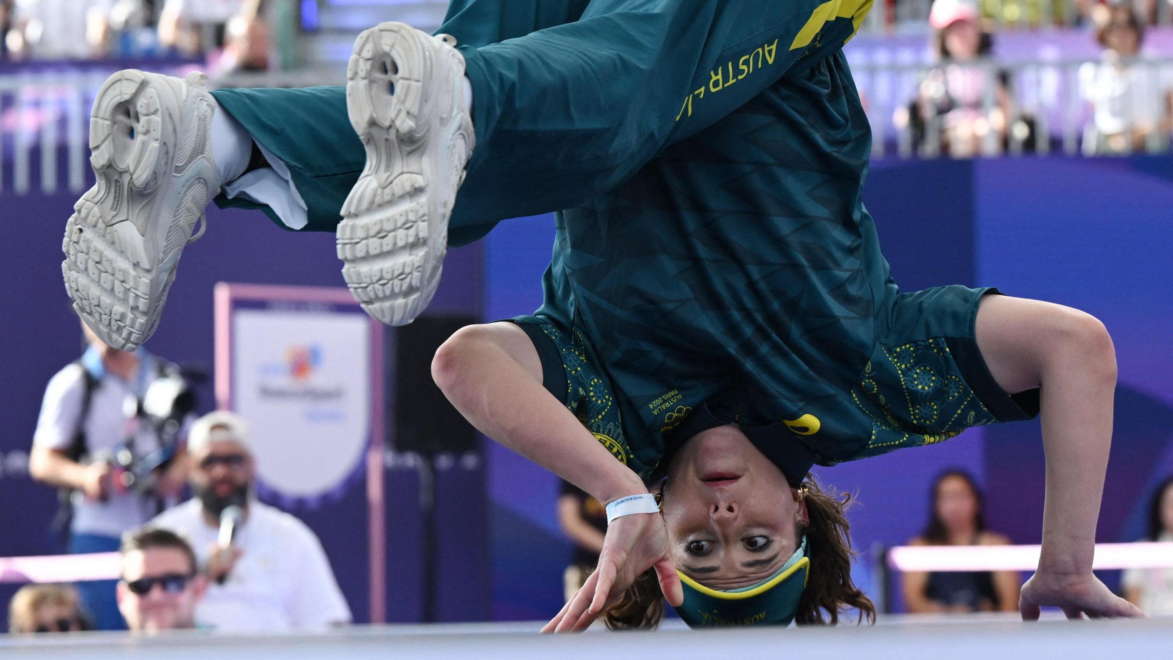 Rachael Gunn, or Raygun, doing a headspin at the 2024 Olympics