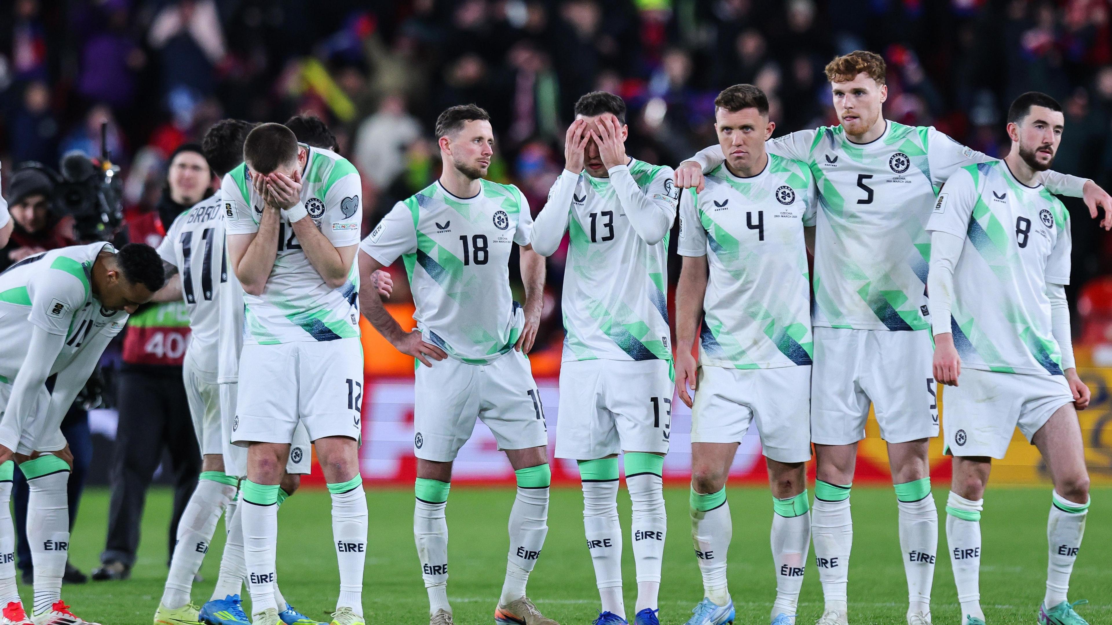 The Republic of Ireland players react to losing on penalties