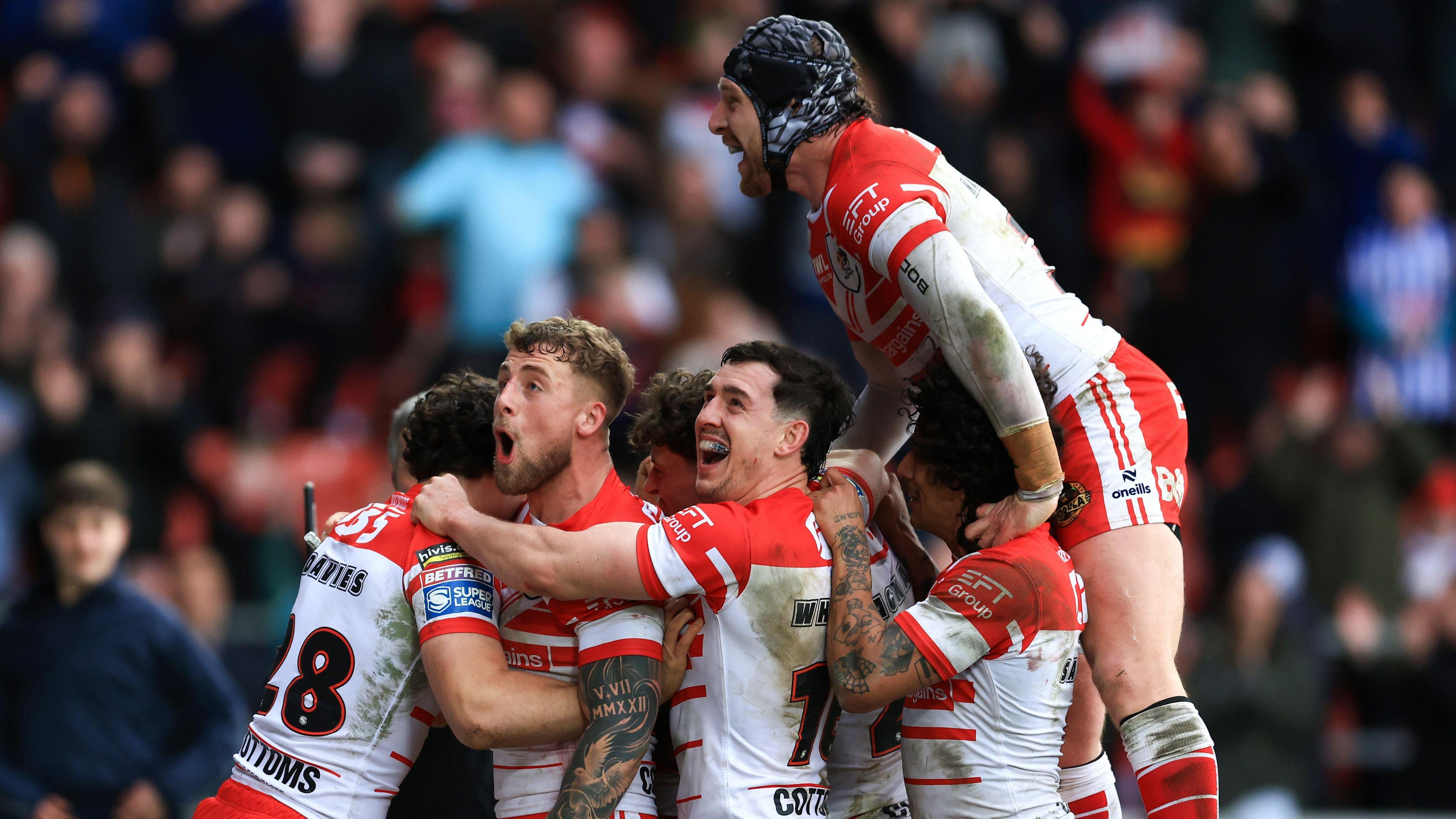 St Helens players just together to celebrate a try