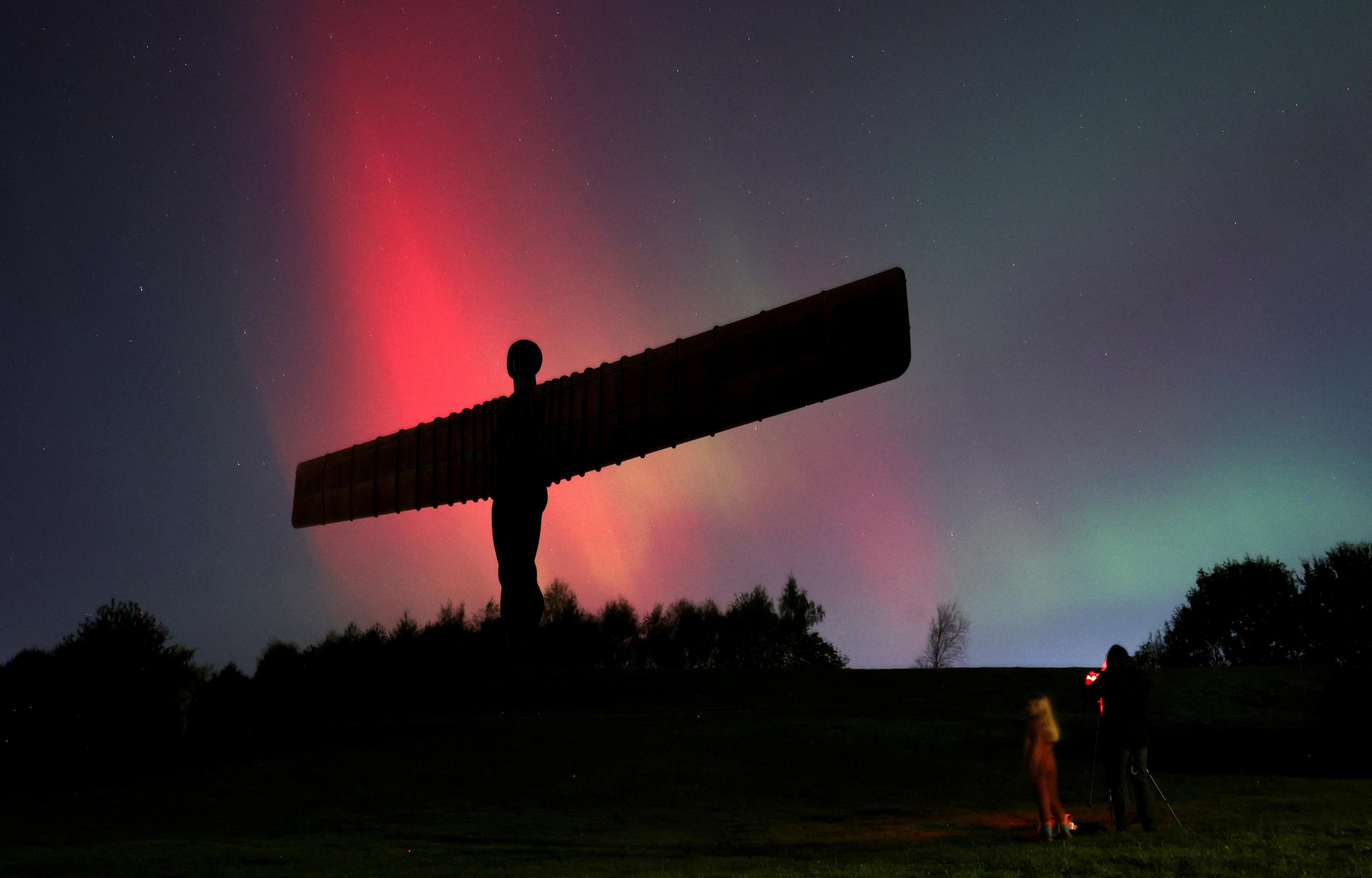 Angel of the North in Gateshead with Northern Lights behind it