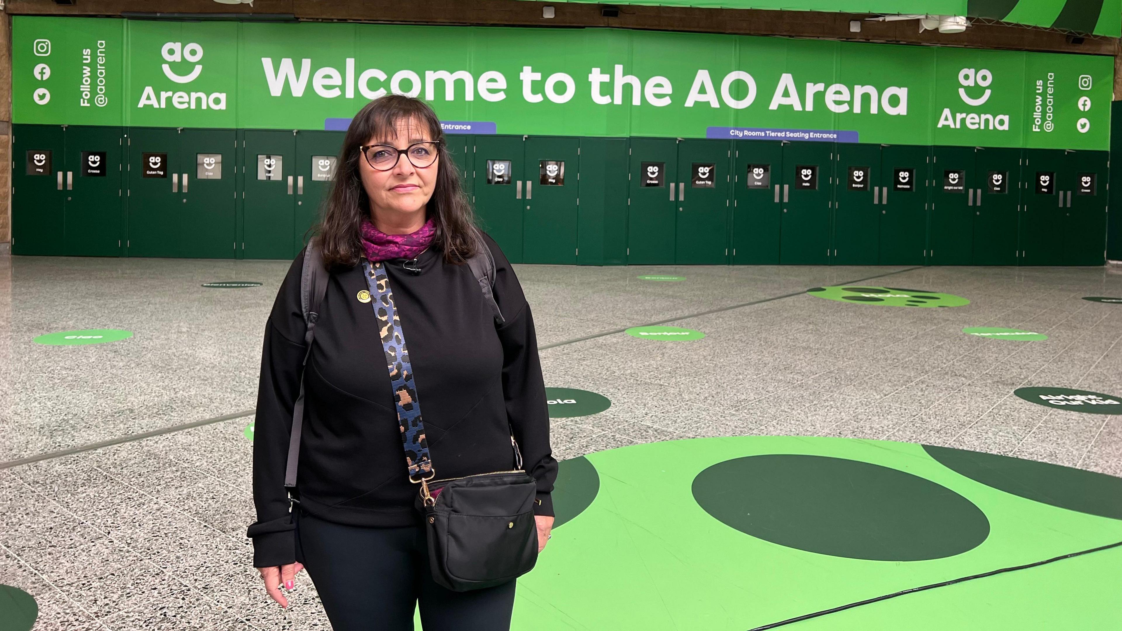 Figen Murray standing outside the AO Arena in Manchester