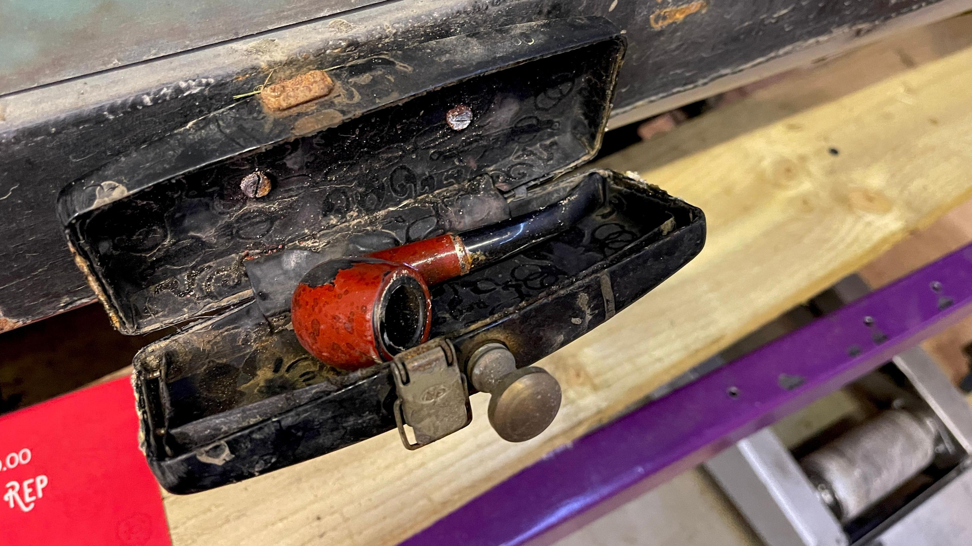 Tanner has bolted an old glasses case to the side of his cyclekart to store his smoking pipe