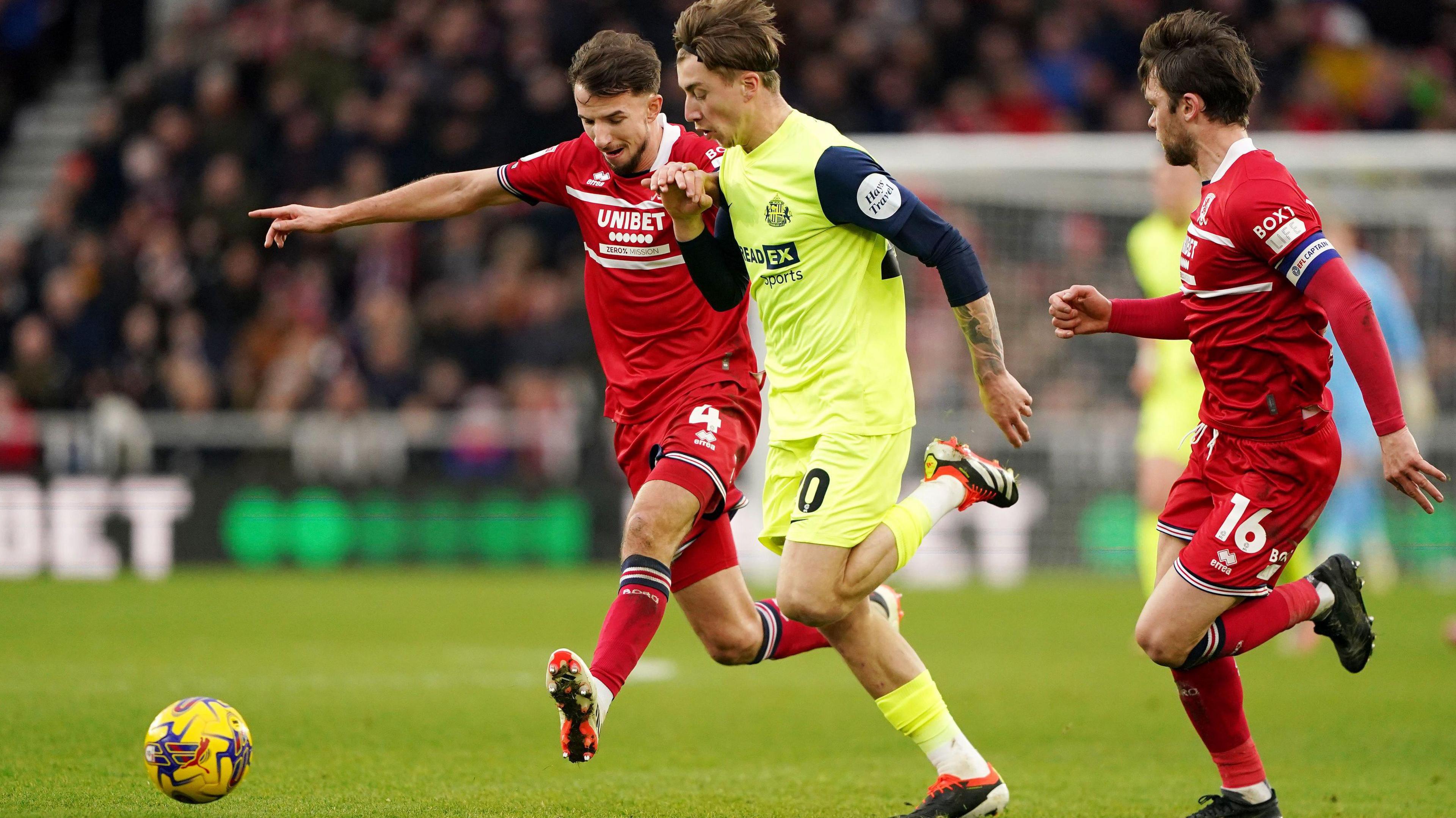 Middlesbrough's Dan Barlaser (left) and Sunderland's Jack Clarke battle for the ball during the Sky Bet Championship match at the Riverside Stadium, Middlesbrough