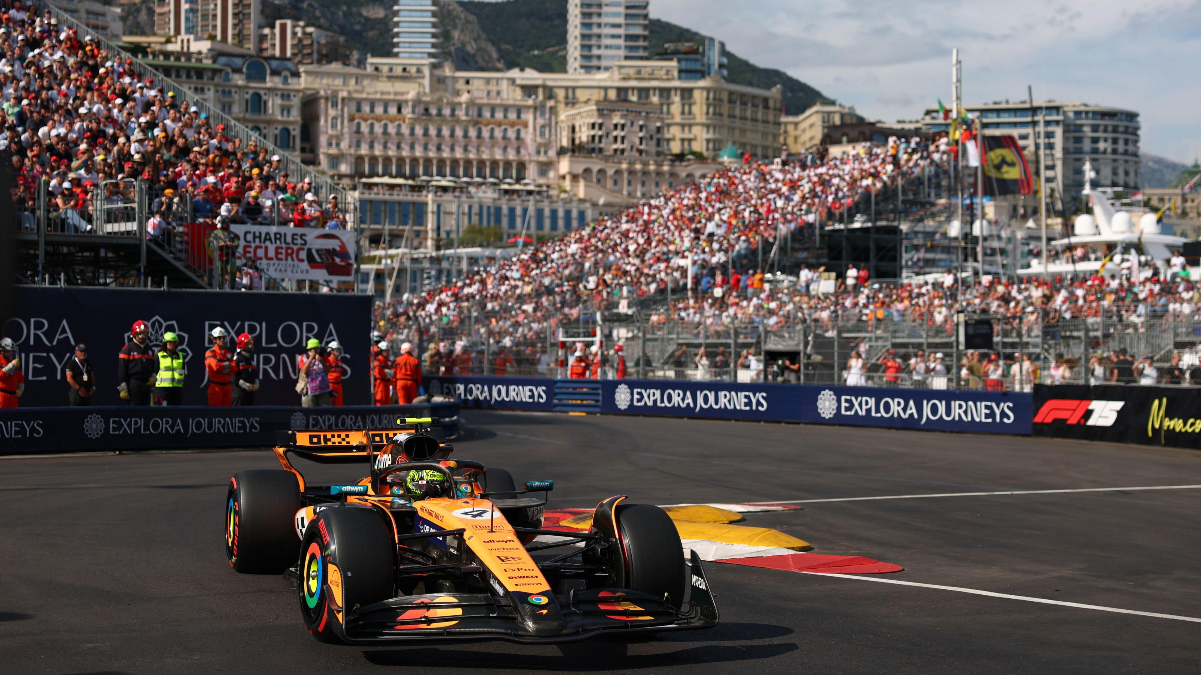Lando Norris drives his McLaren through the swimming pool complex during qualifying for the 2025 Monaco Grand Prix