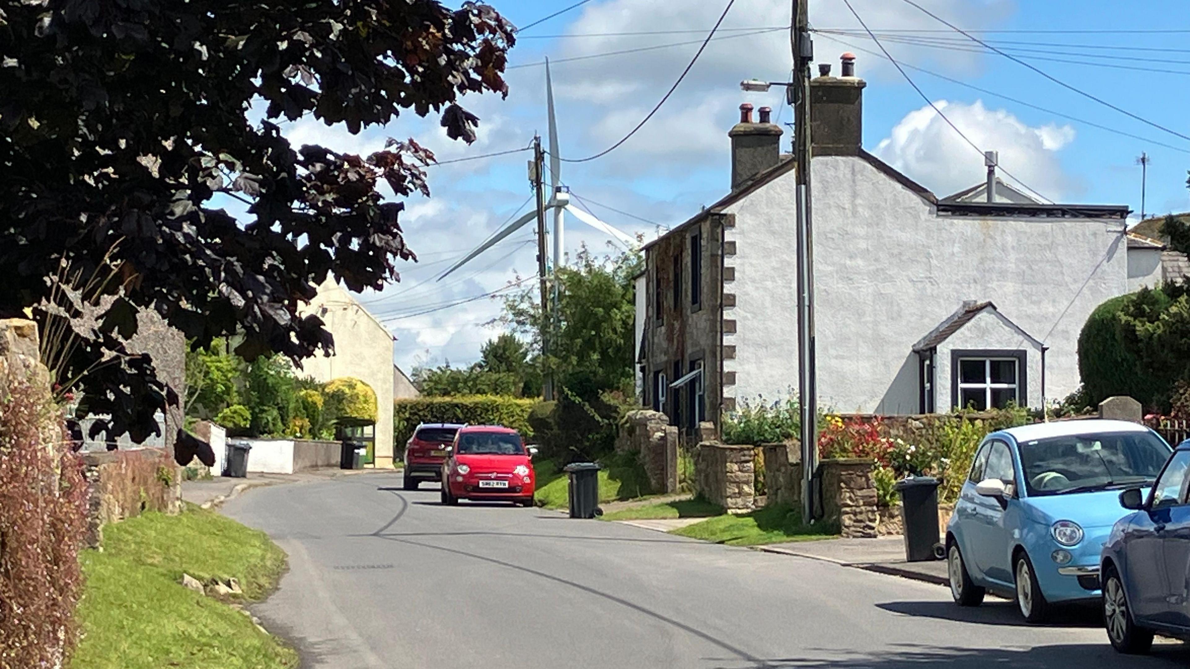 Wind turbine seen from the village of Tallentire, Cumbria