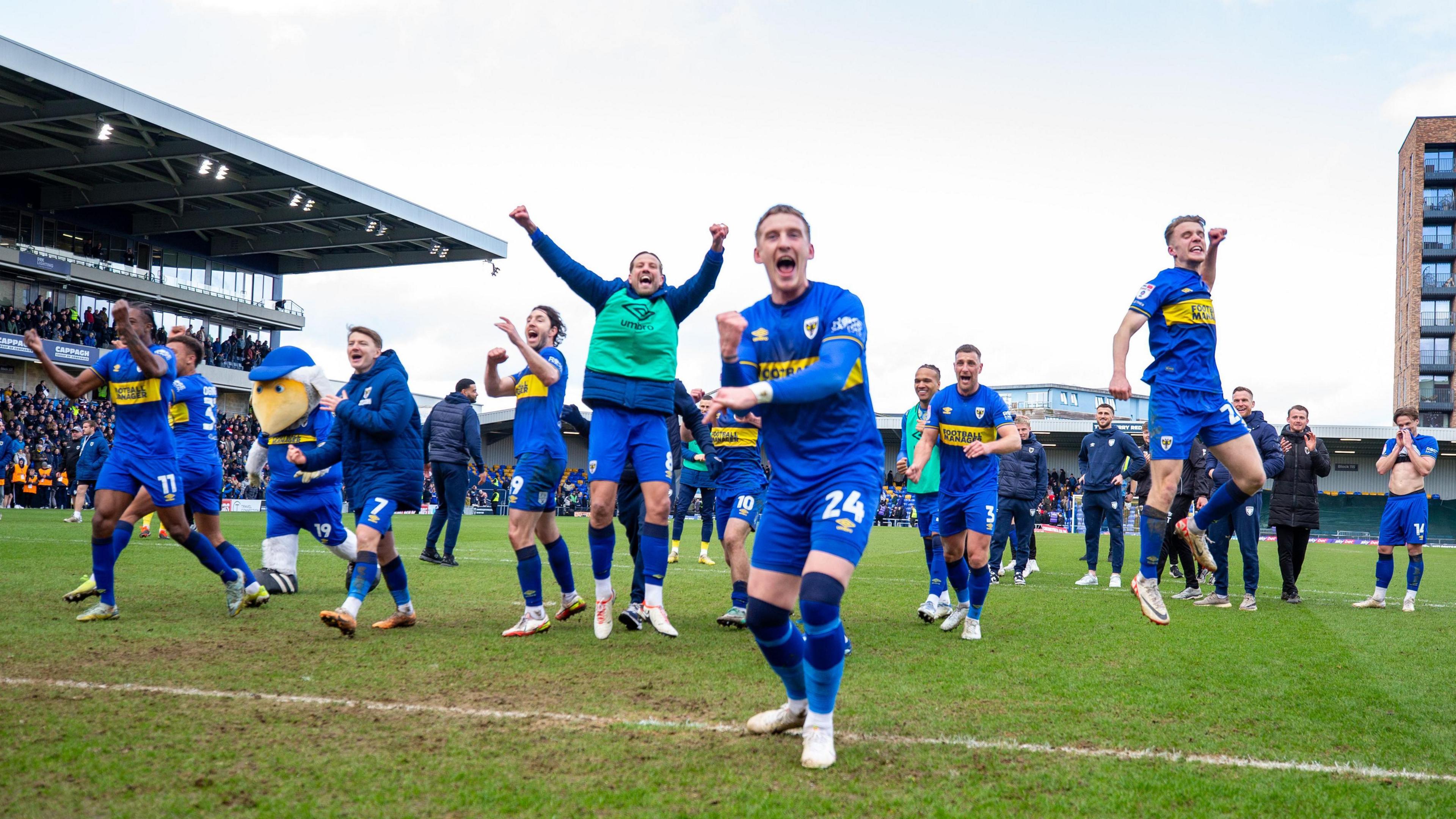 AFC Wimbledon celebrate winner against MK Dons