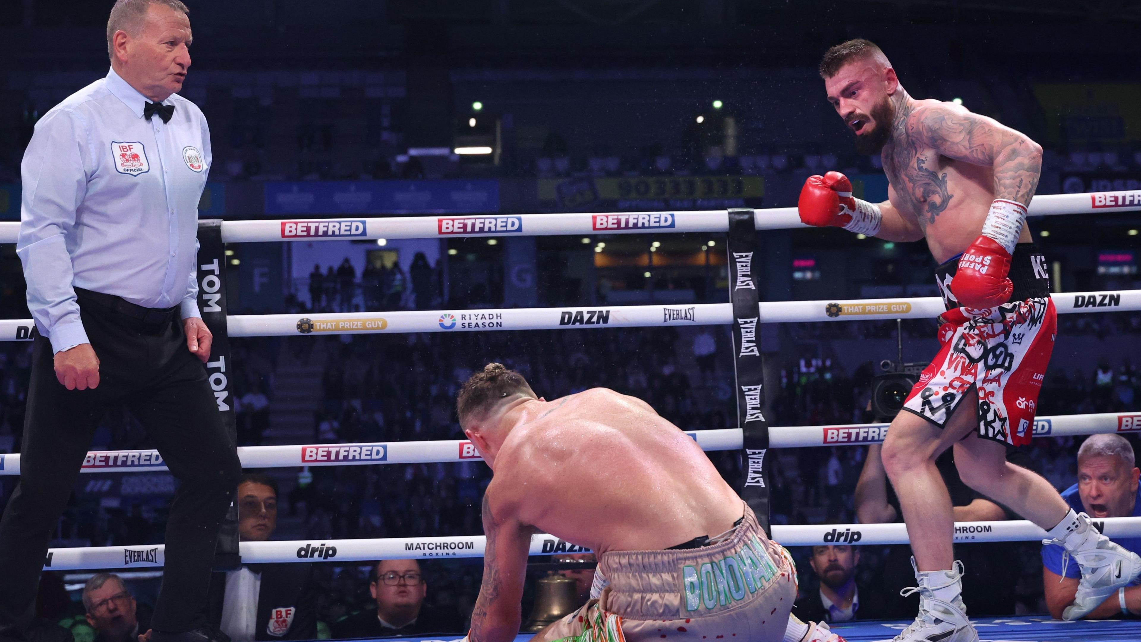 Lewis Crocker knocks Paddy Donovan down 