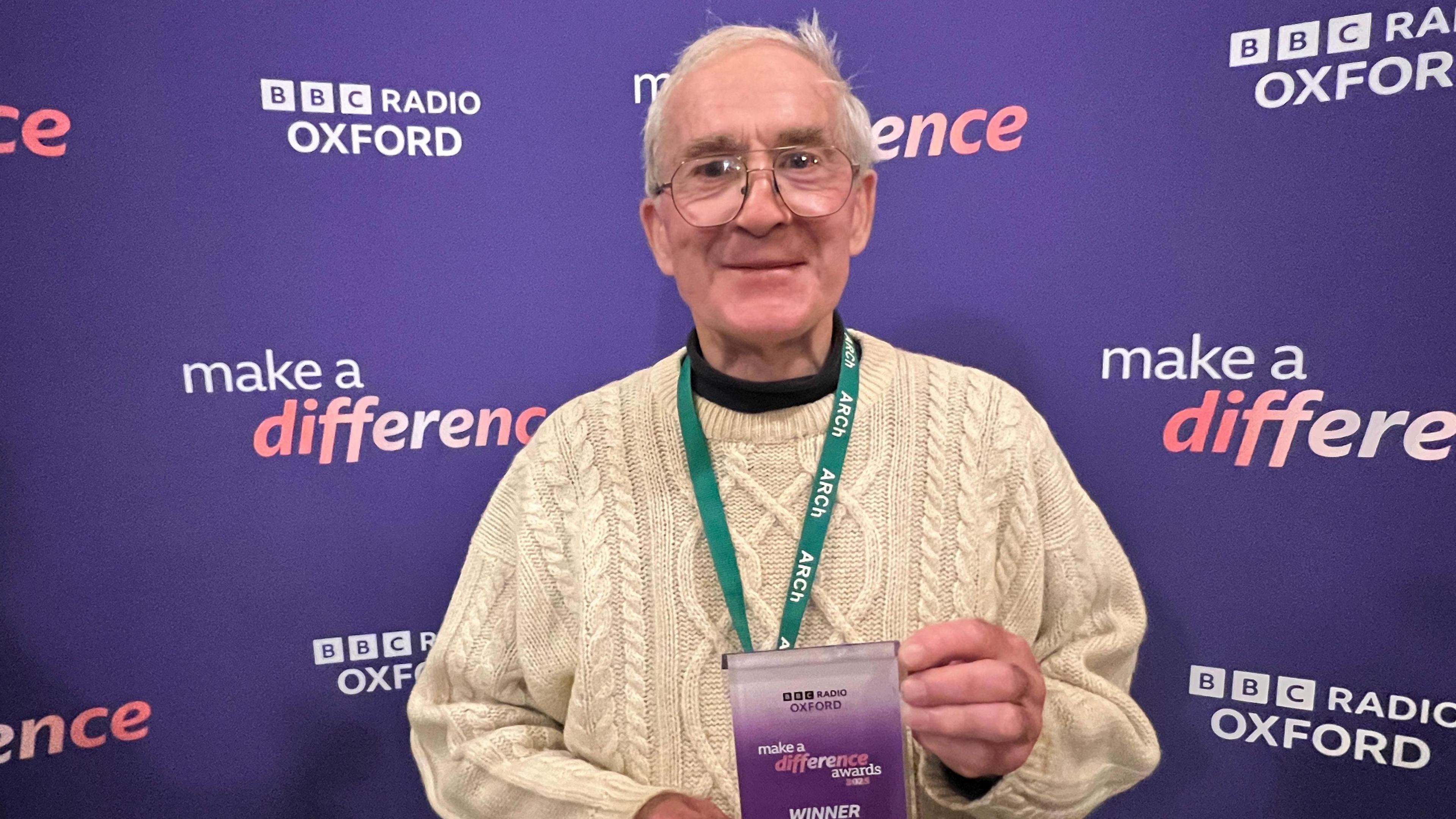 Don Ferris holding his award