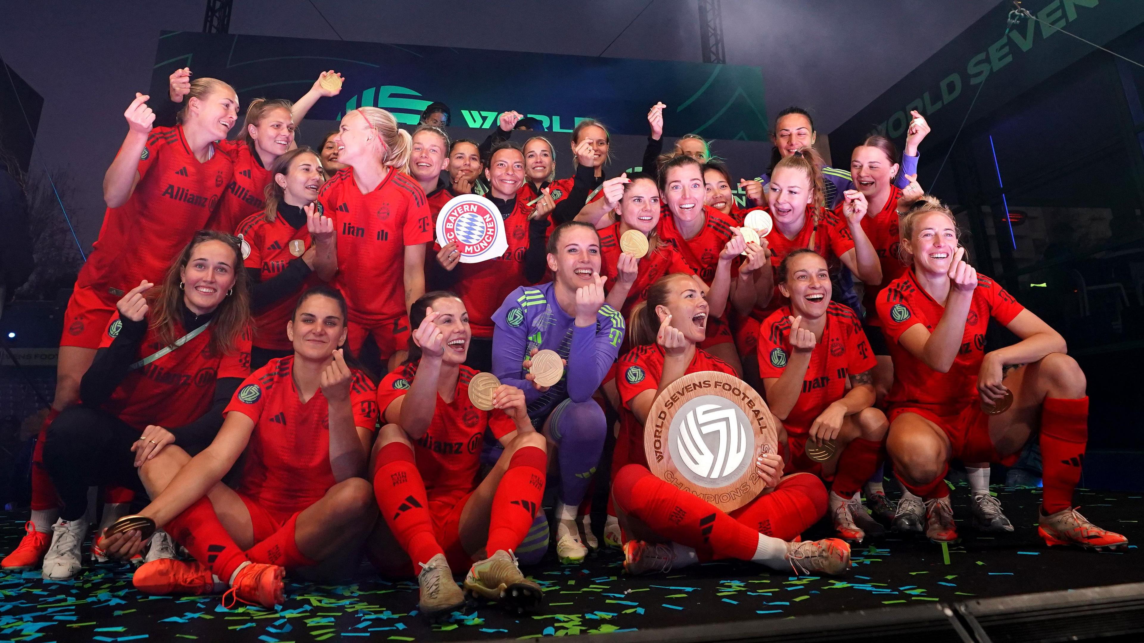 Bayern Munich players celebrate with their trophy