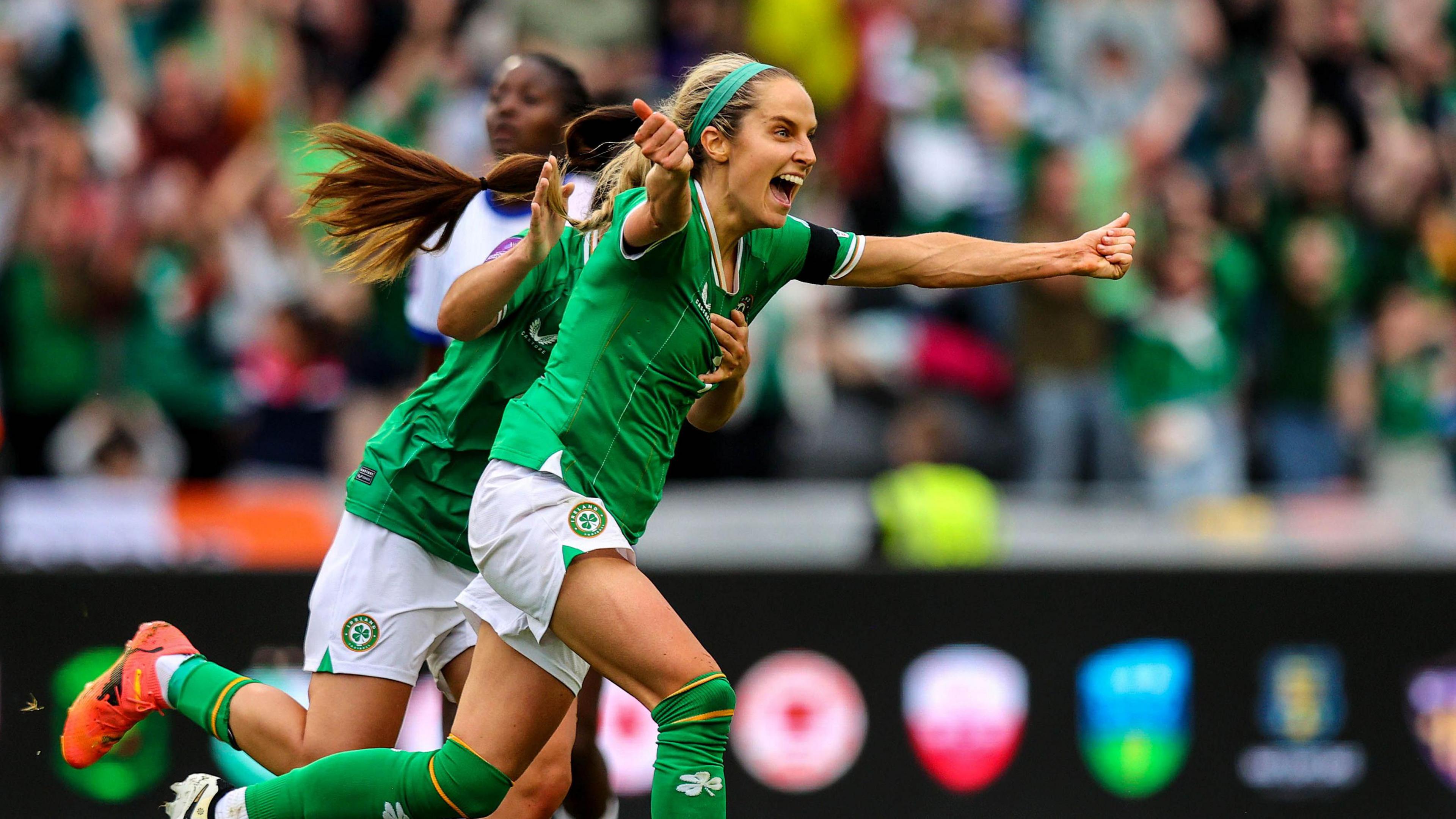 Julie-Ann Russell celebrates scoring