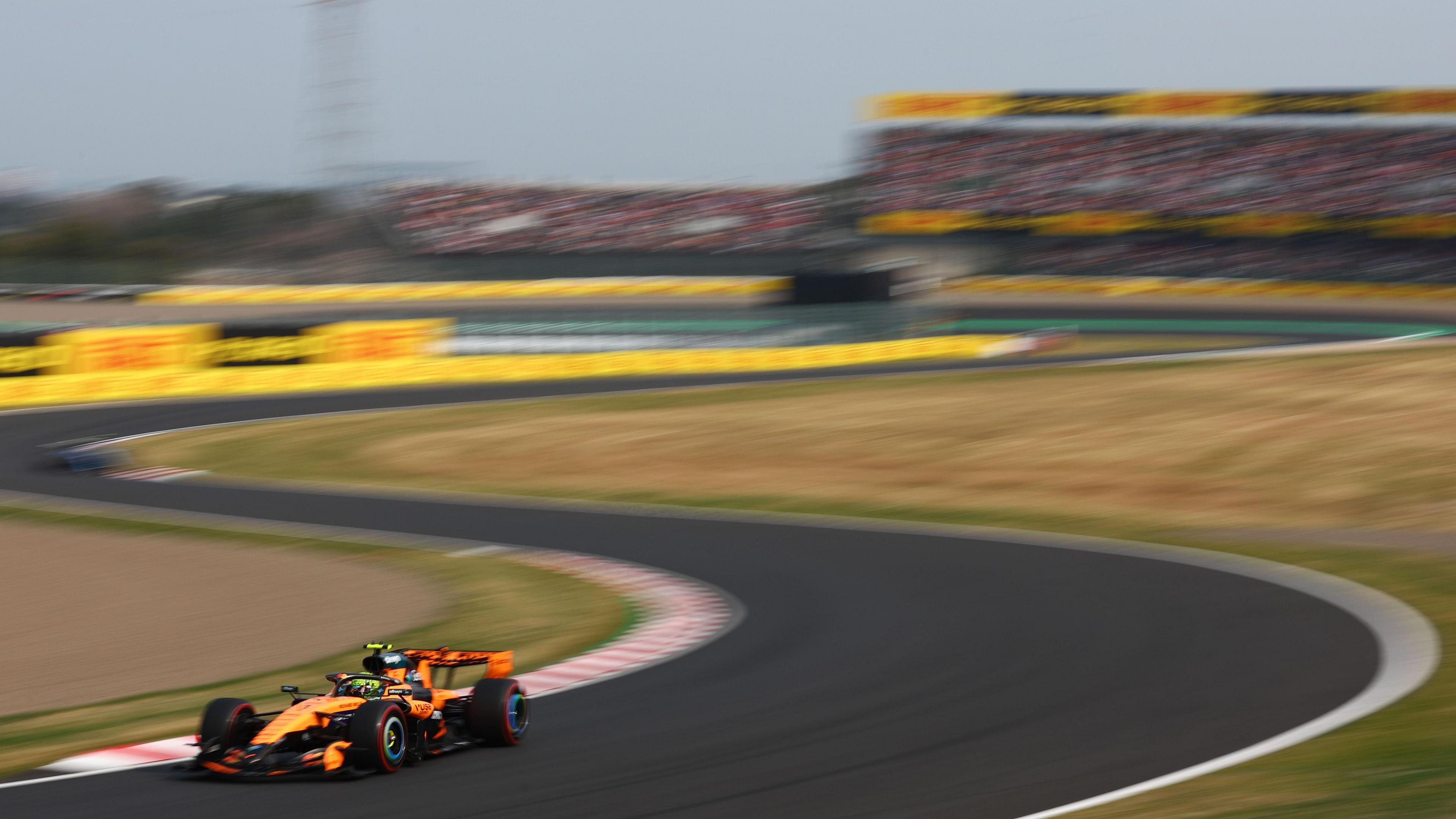 Lando Norris drives his McLaren through the Esses during Japanese Grand Prix qualifying