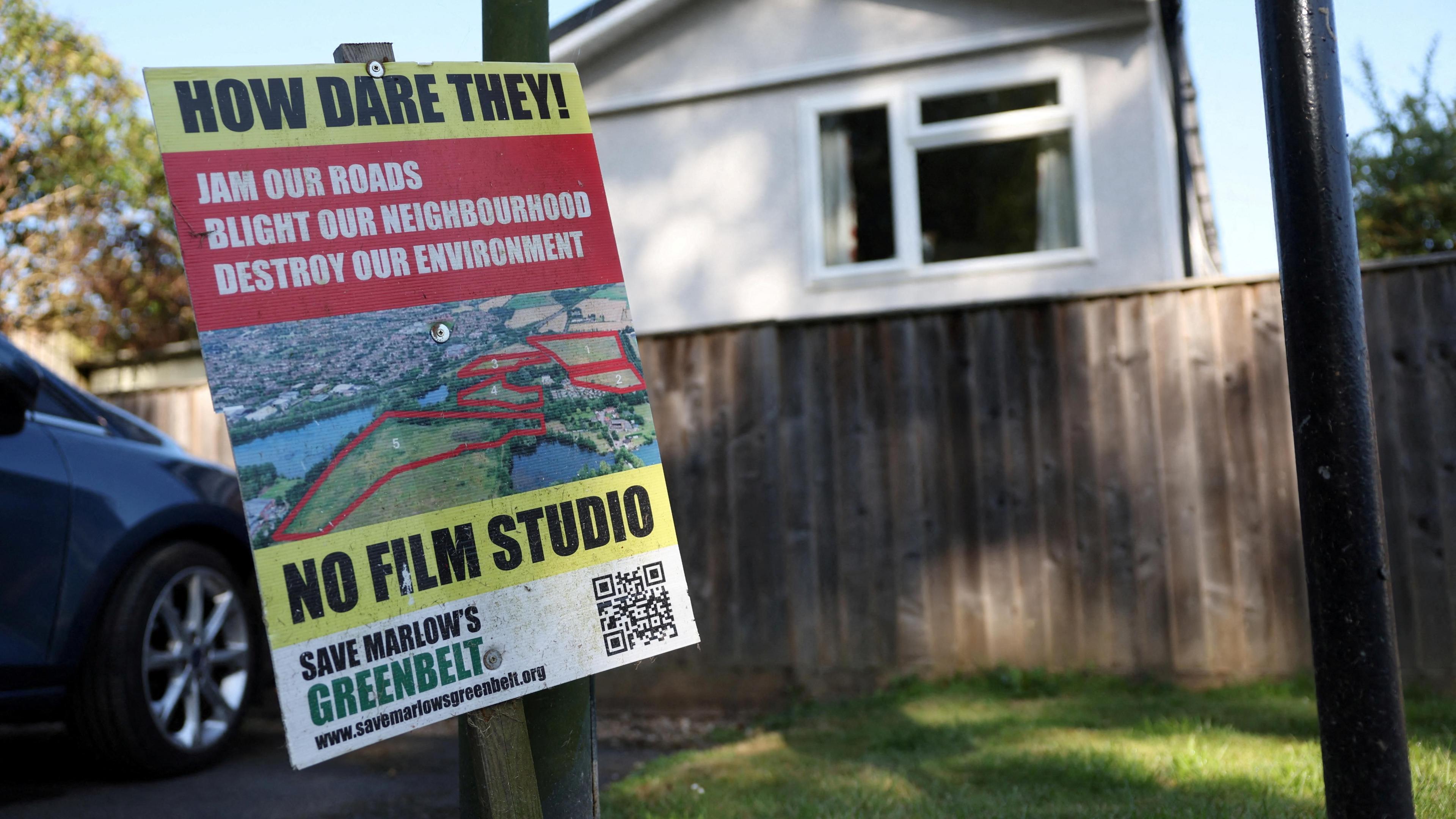 A sign protesting the plans to build a new major British film studio is posted in Marlow