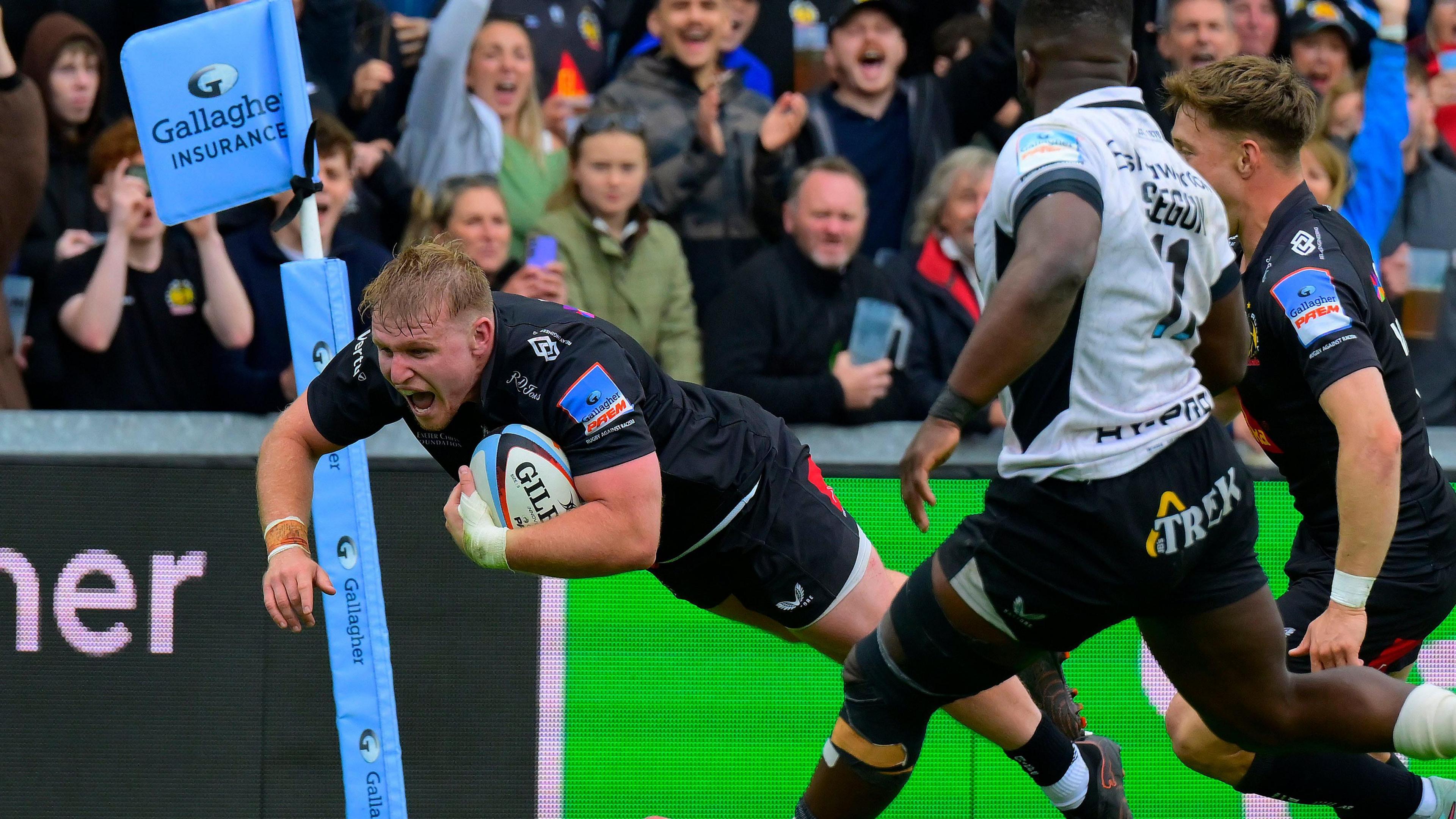 Max Norey dives over in the left corner to score Exeter's first try at the end of the first half 
